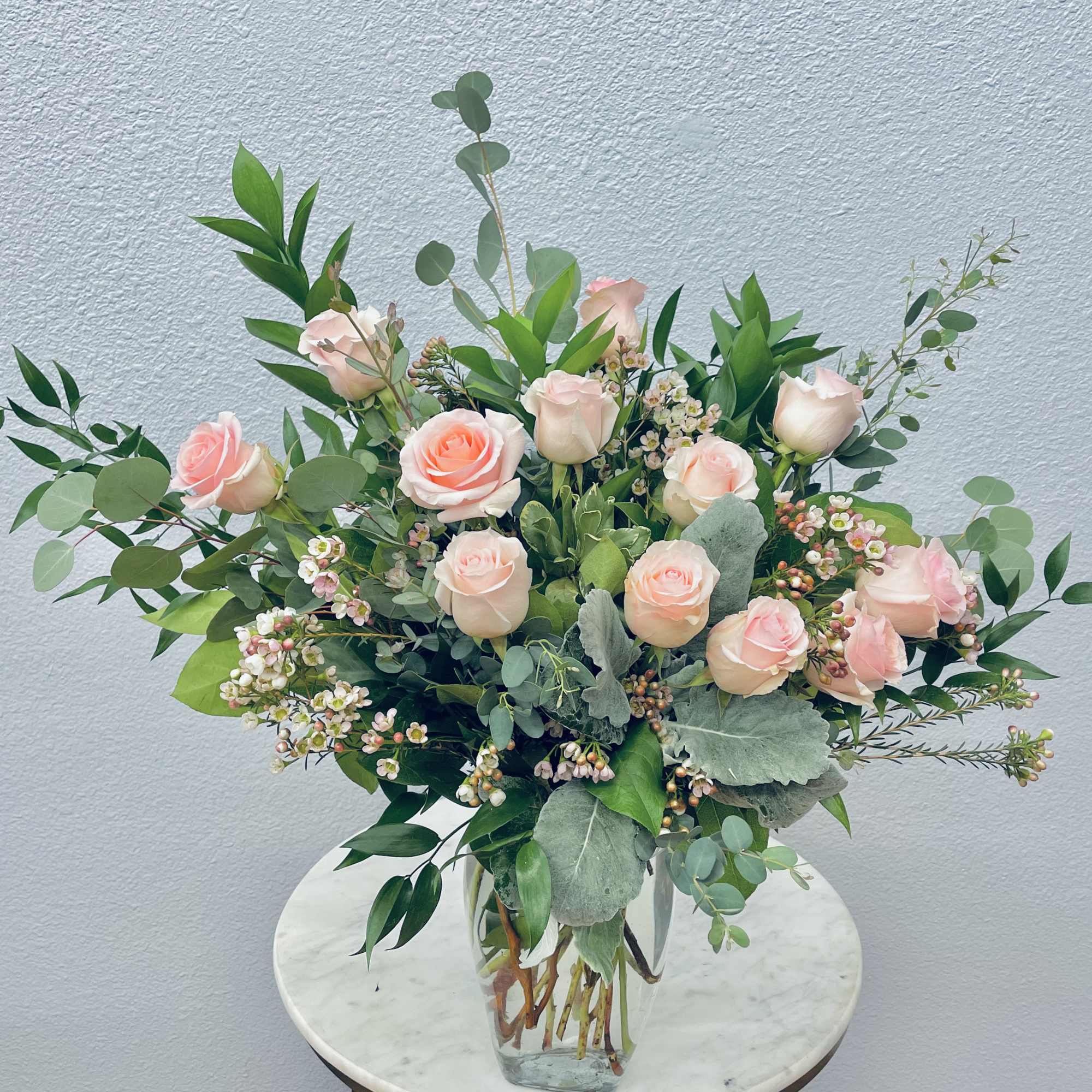 Color Palette: pastel roses
One dozen premium roses tucked into botanical eucalyptus and, photo 2 of 3