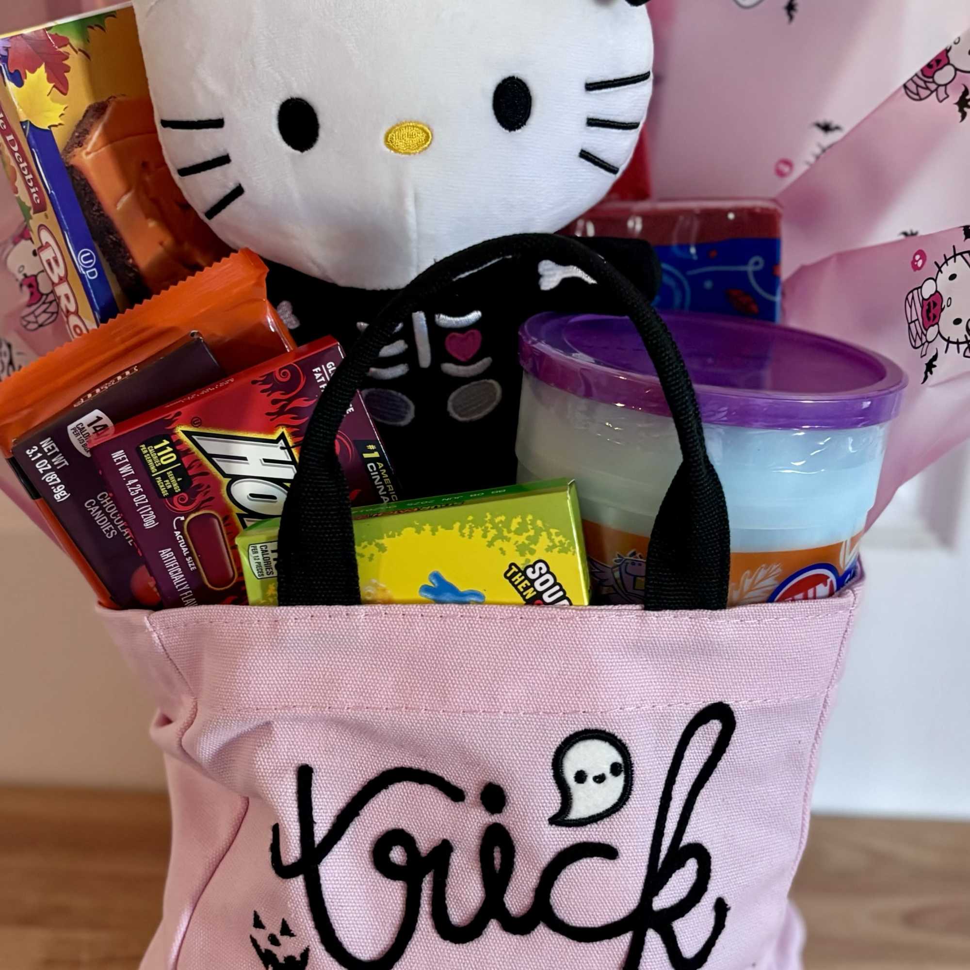 Adorable canvas tote filled with goodies 
Hello kitty plushie is not
Included but