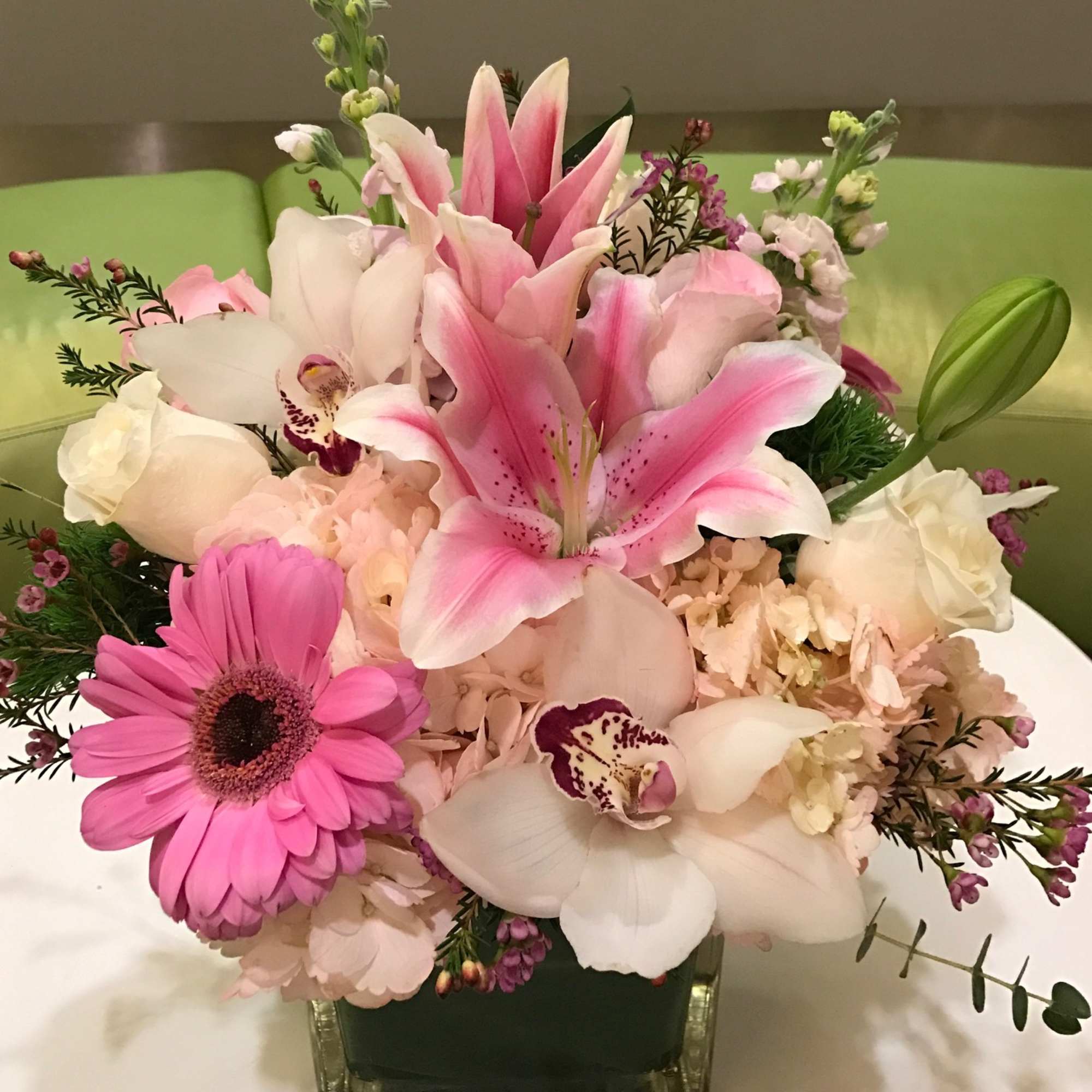 Pink and white floral arrangement in a square glass vase, photo 2 of 6