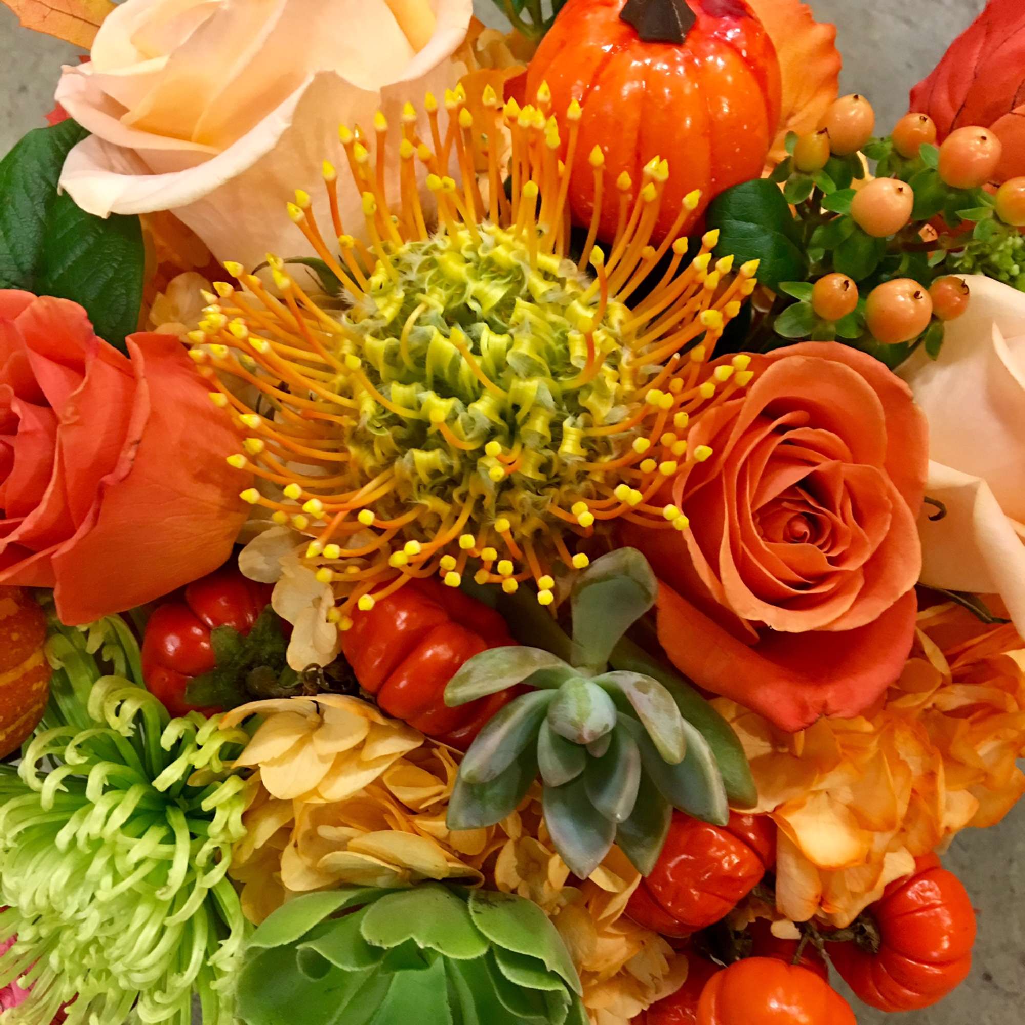 collection of flowers and goods in a custom made vase ,makes a, photo 3 of 3