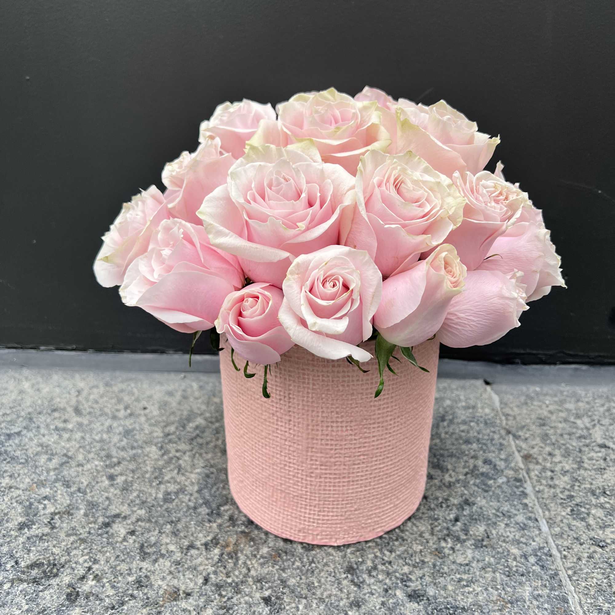 Pink roses arranged in a round pink box, photo 2 of 5