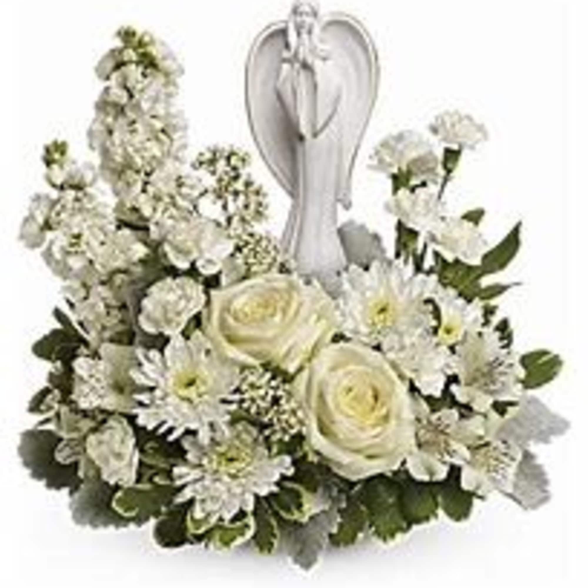 White floral arrangement with an angel figurine centerpiece