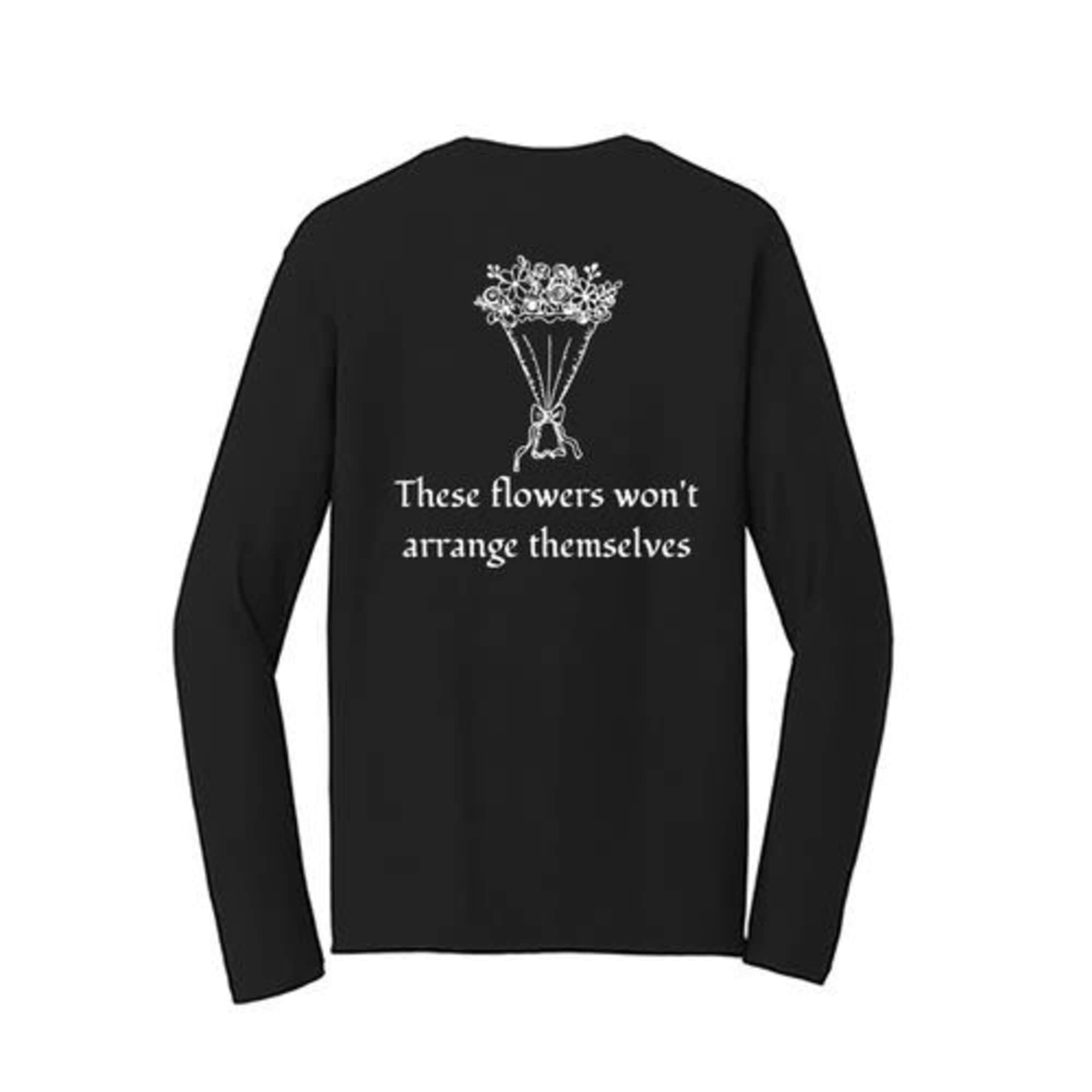 Black long-sleeve shirt with a white flower bouquet graphic and text