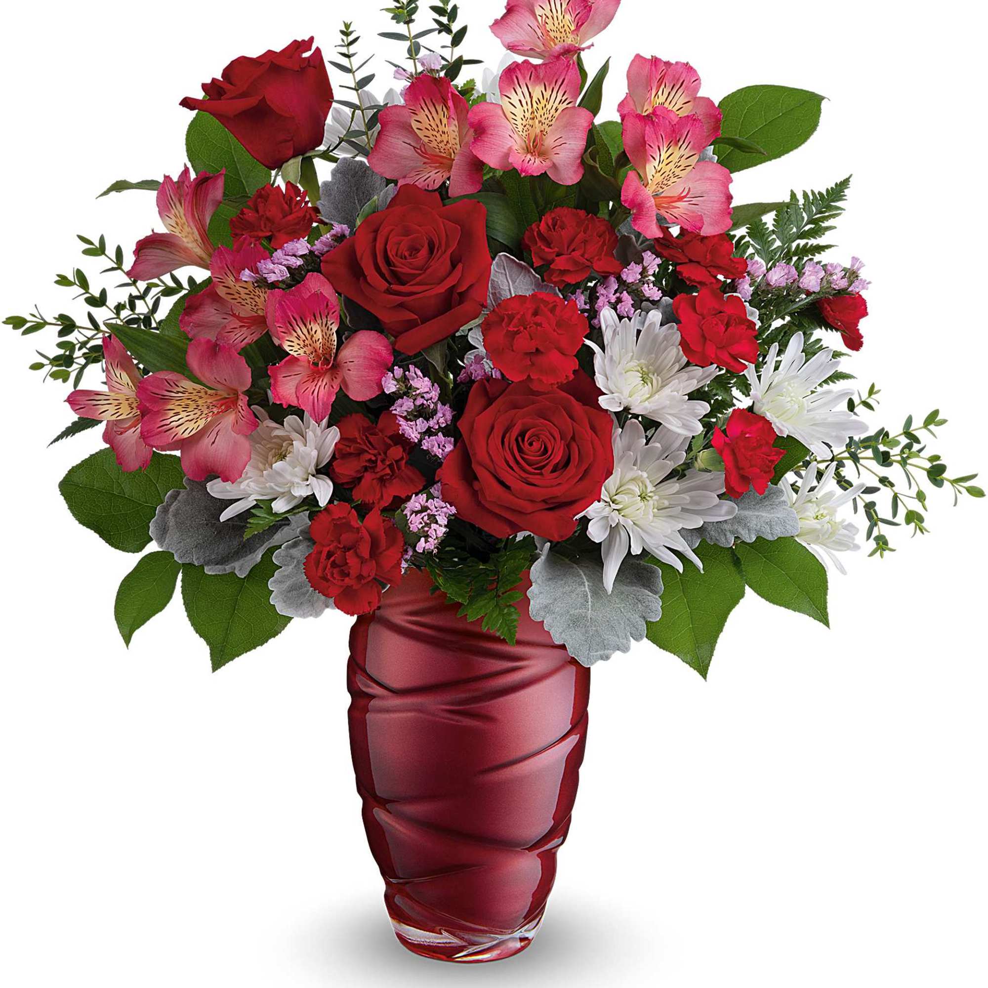 Red roses and pink alstroemeria in a red glass vase
