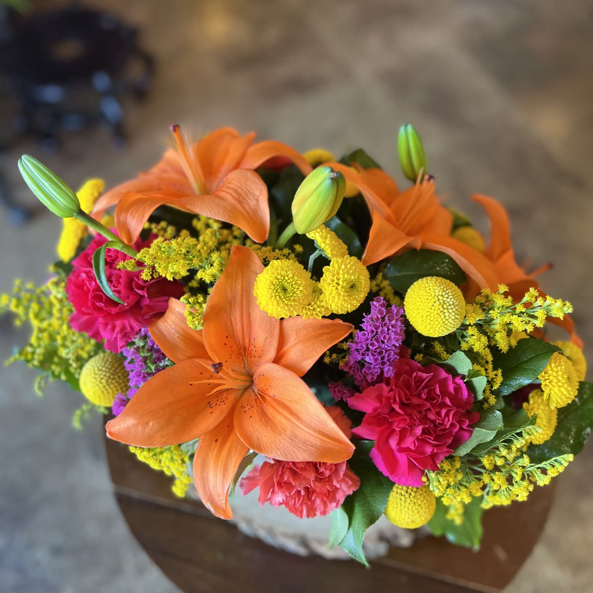 This bold, bright, and fiery boxed arrangement contains orange day lilies, solidago, photo 2 of 2