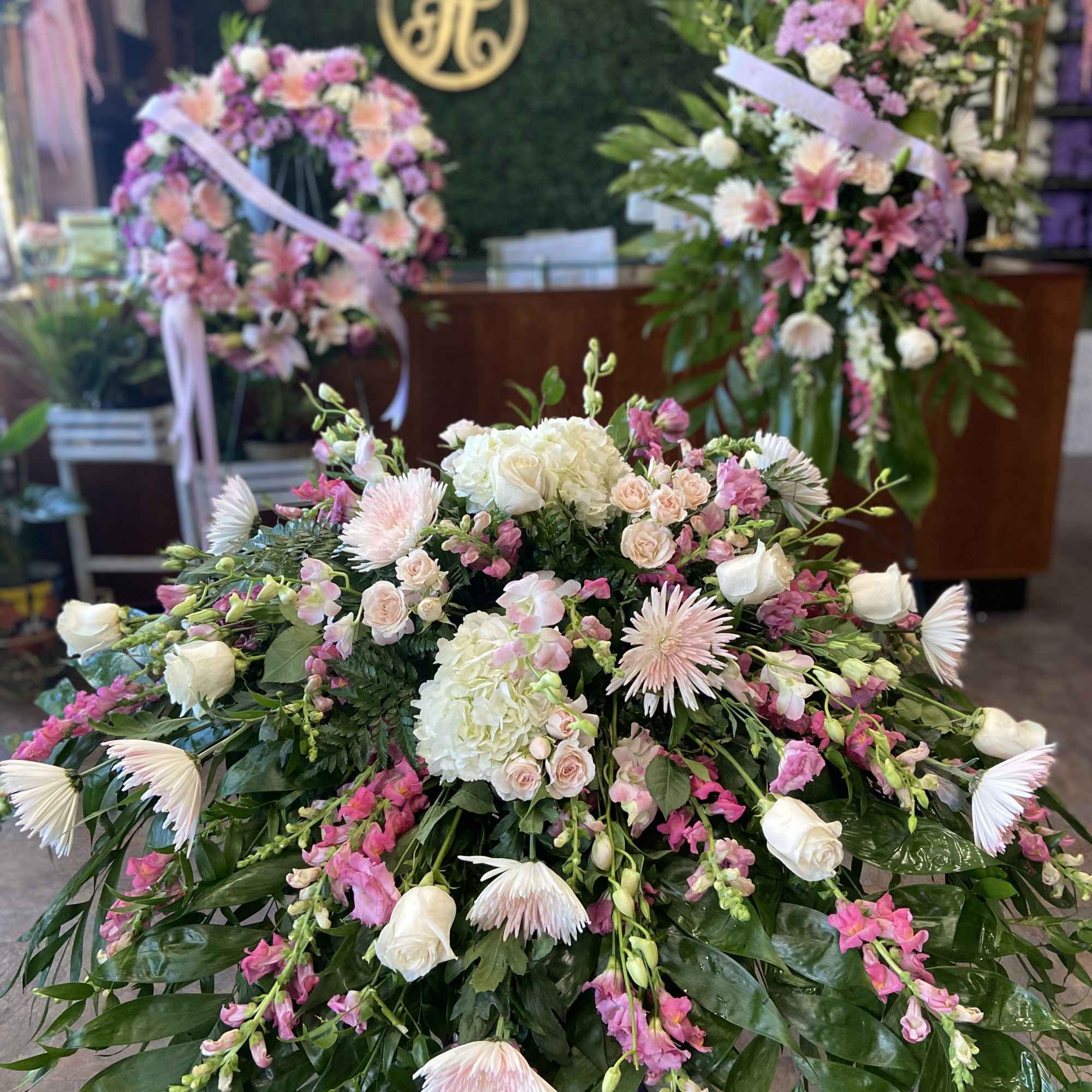Large pink and white floral spray with roses and hydrangeas