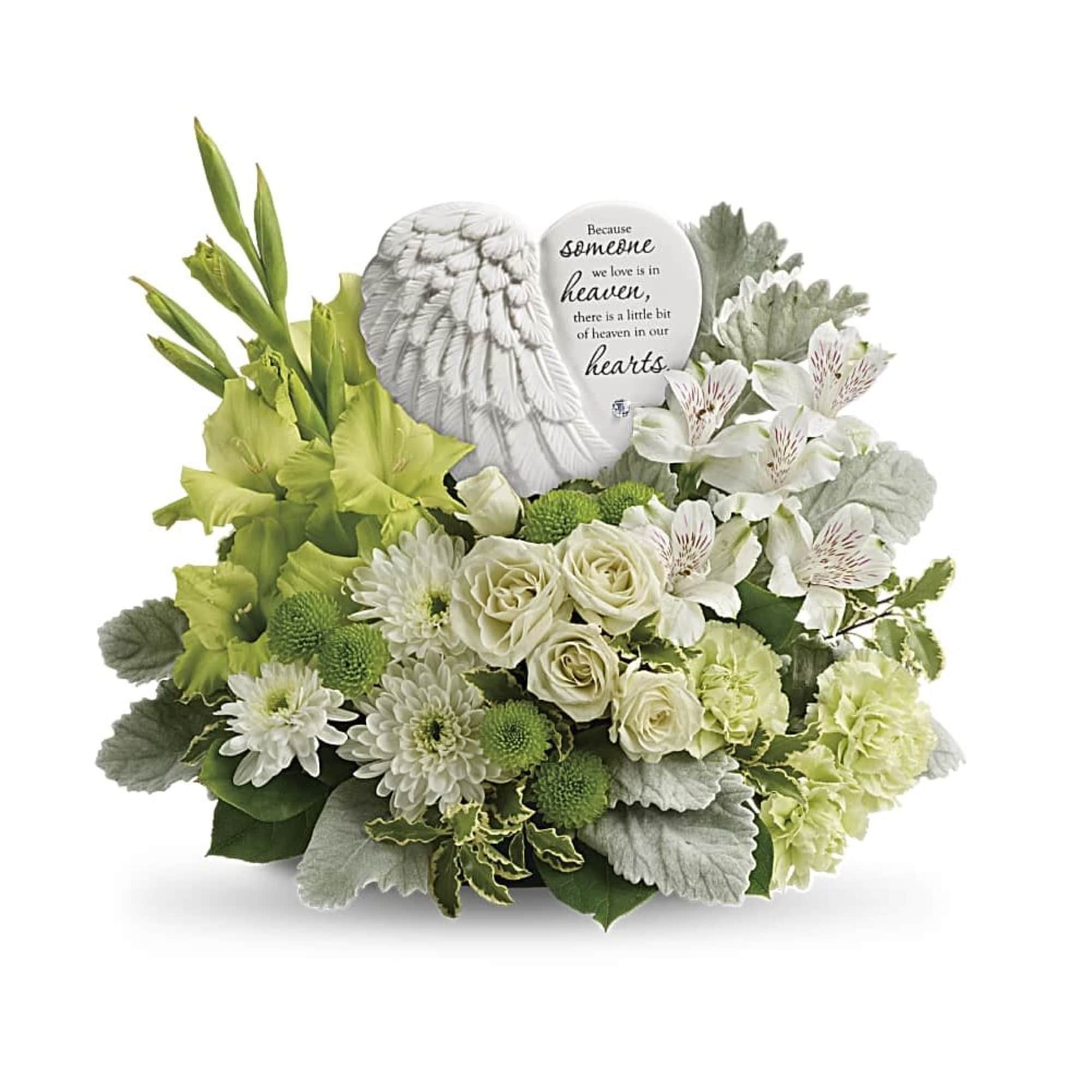 White and green sympathy arrangement with angel wings and memorial plaque