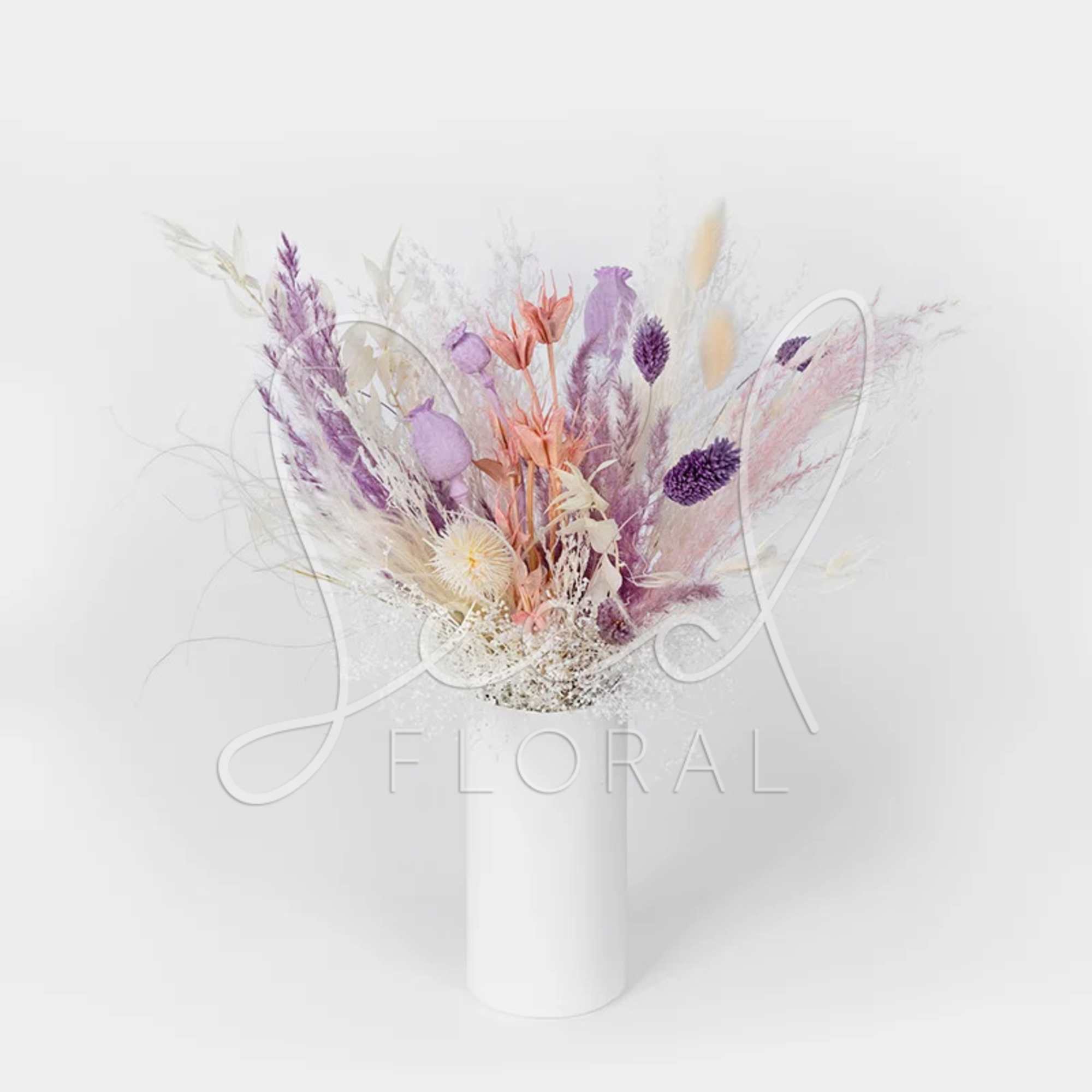 Pastel dried flower arrangement in a white vase