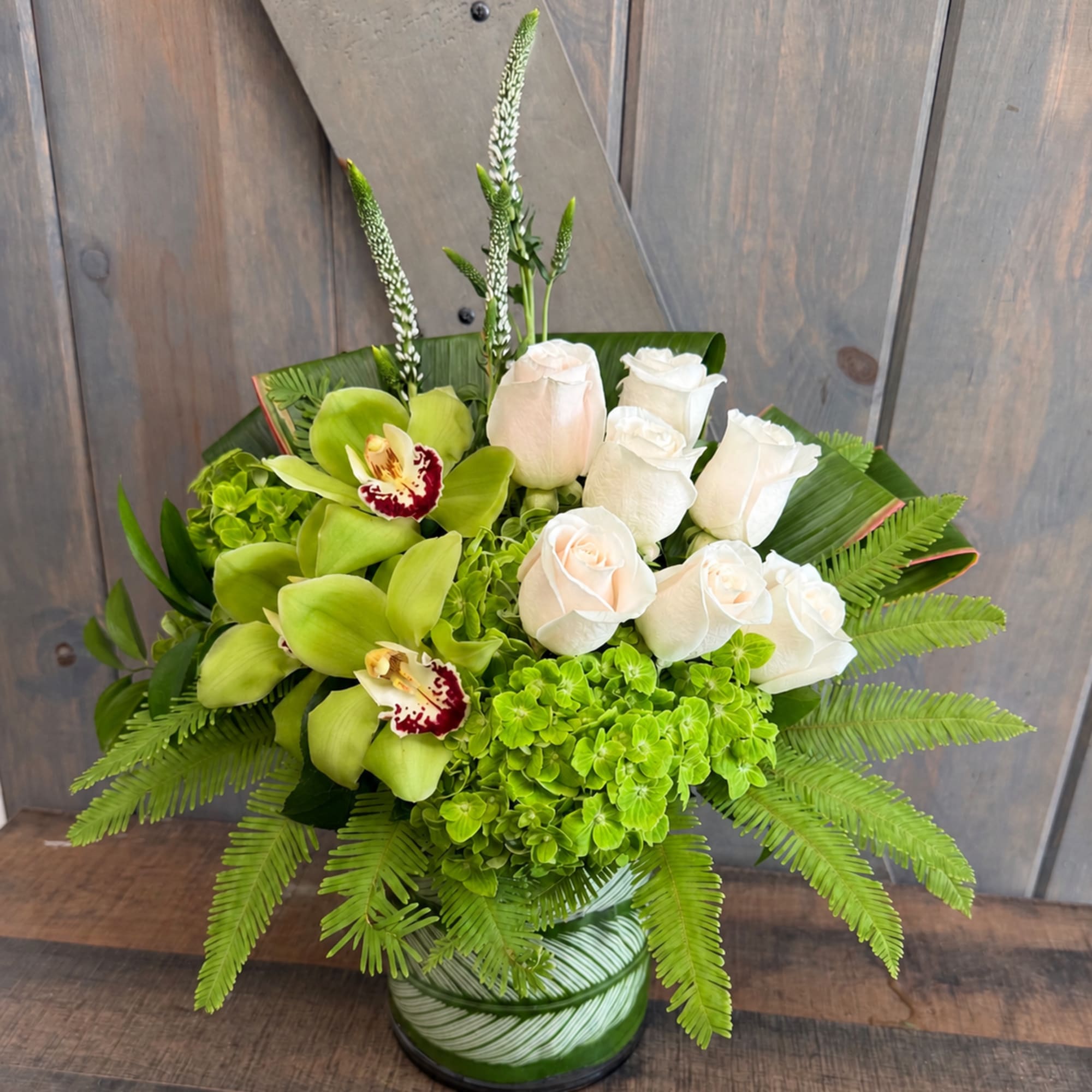 Included in this design are Roses, Hydrangea, Cymbidium Orchids, Alstroemeria, Veronica, Ti, photo 2 of 2