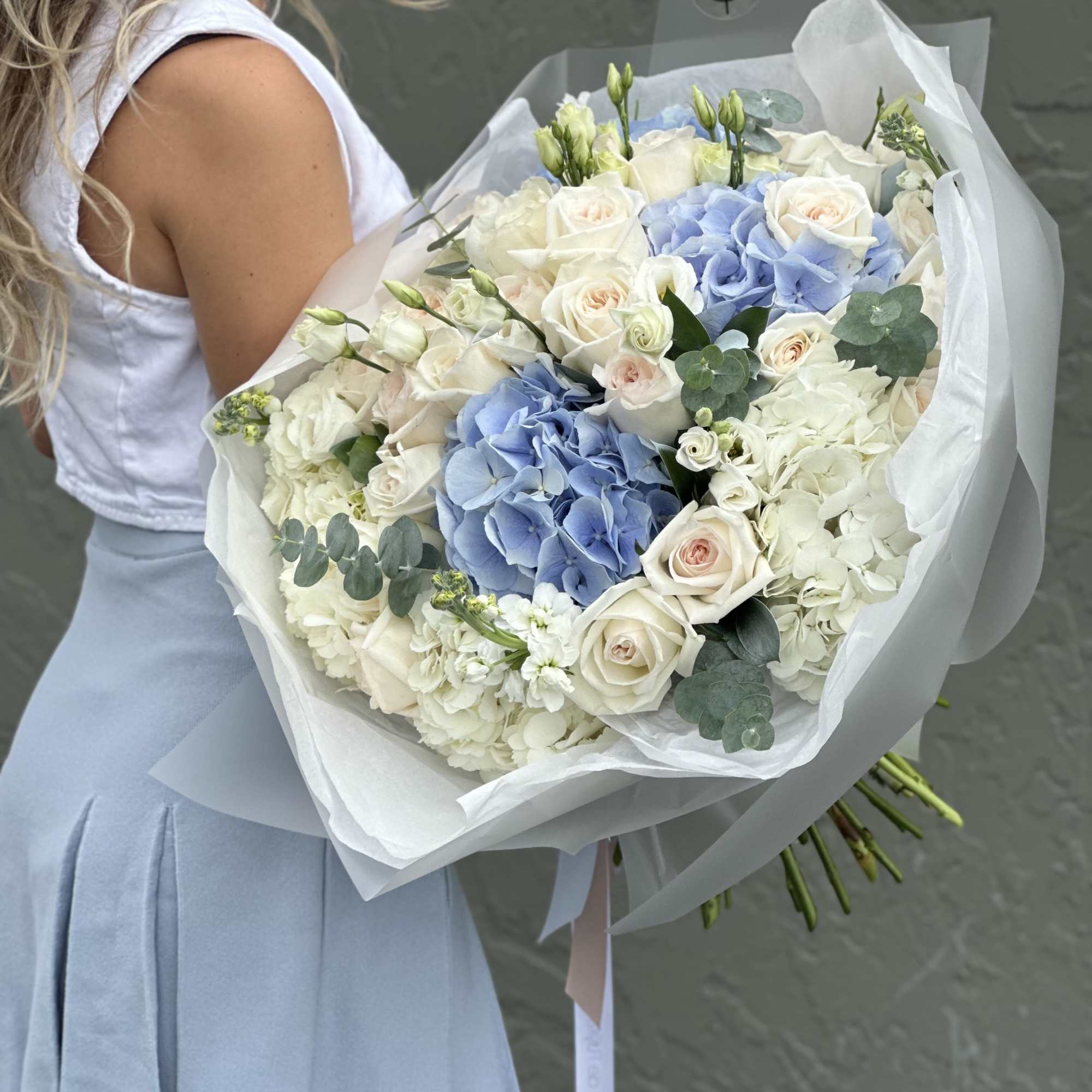 Large bouquet of white roses and blue hydrangeas wrapped in white paper, photo 4 of 4