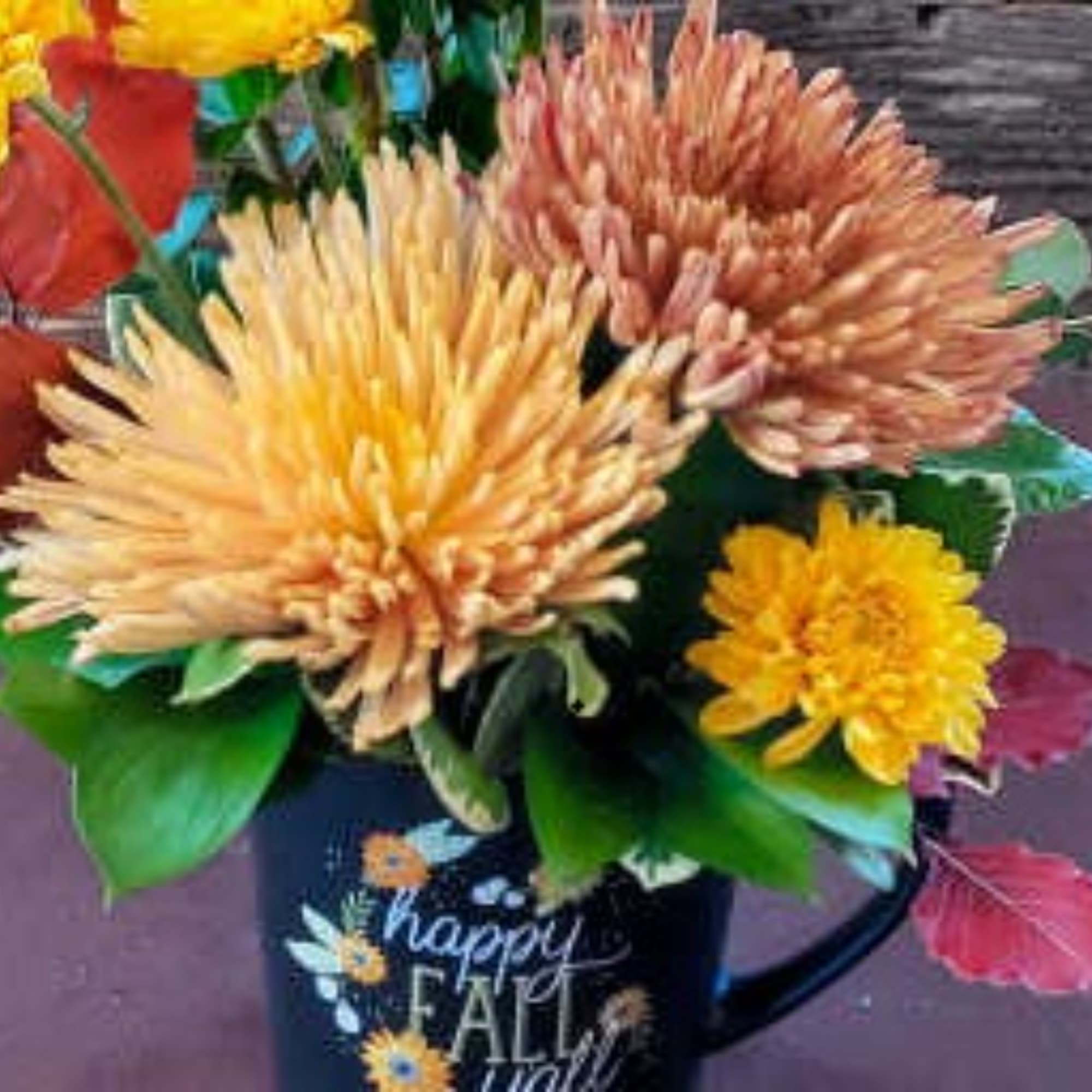 Mug with fall chrysanthemums and a "happy fall" design