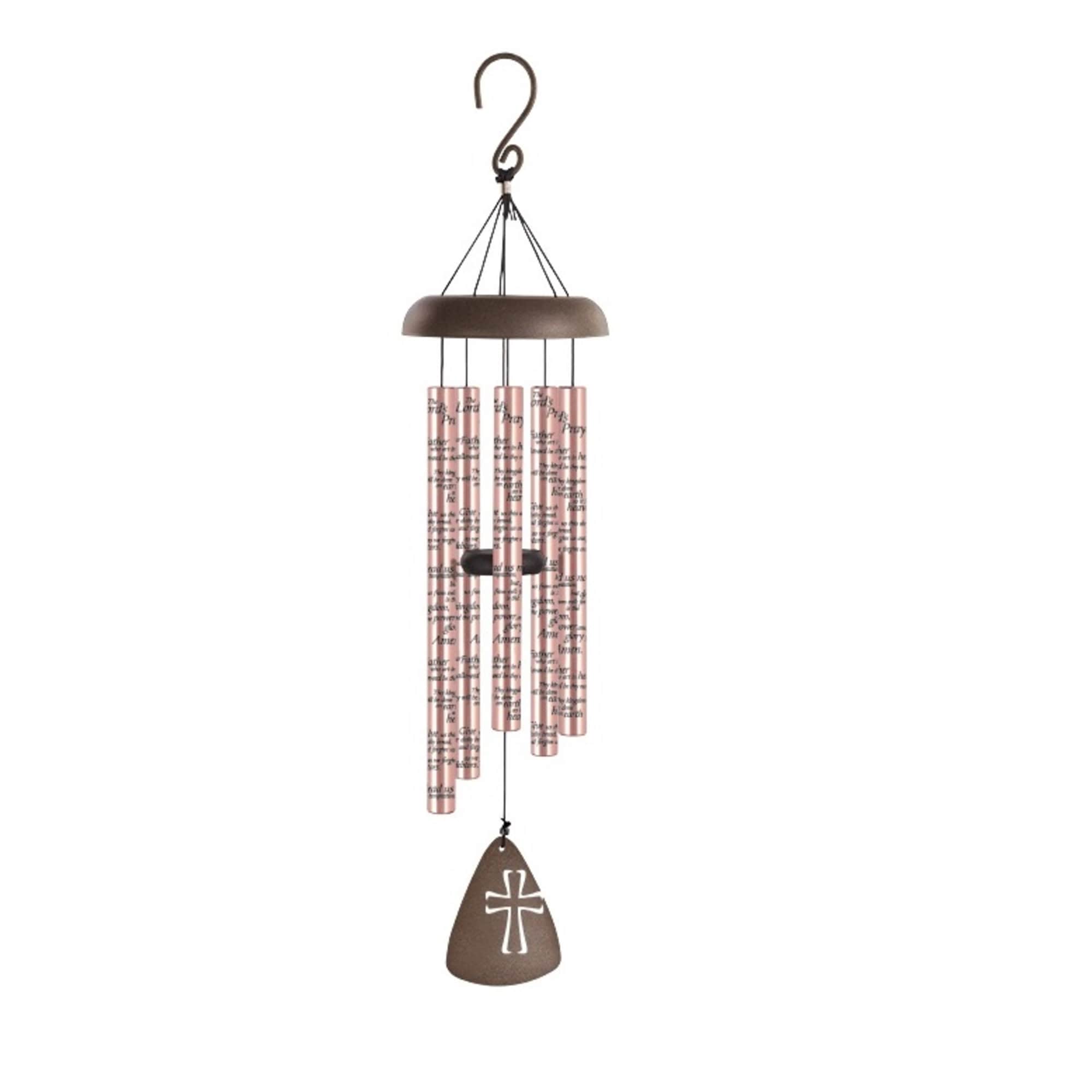 Hanging wind chime with pink tubes and a brown cross-shaped pendant
