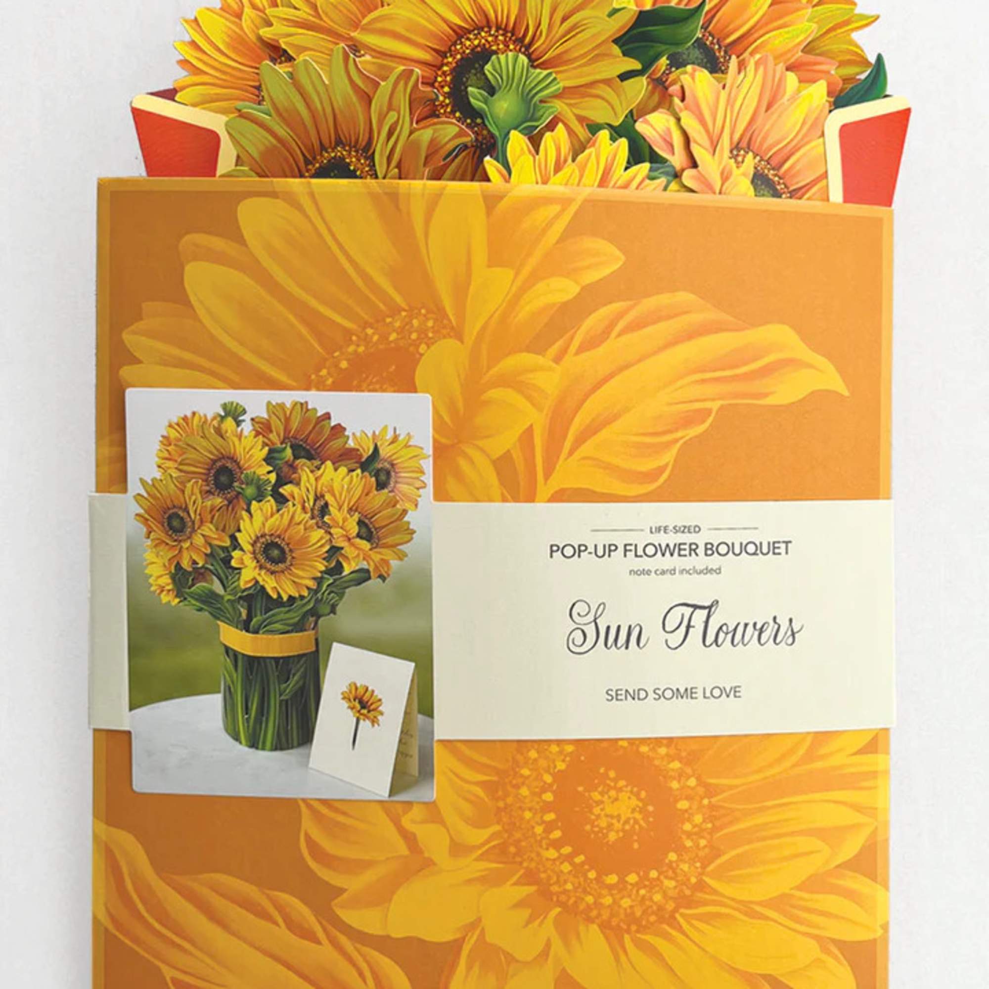 Stunning paper floral bouquet pops open and brings color to any room.