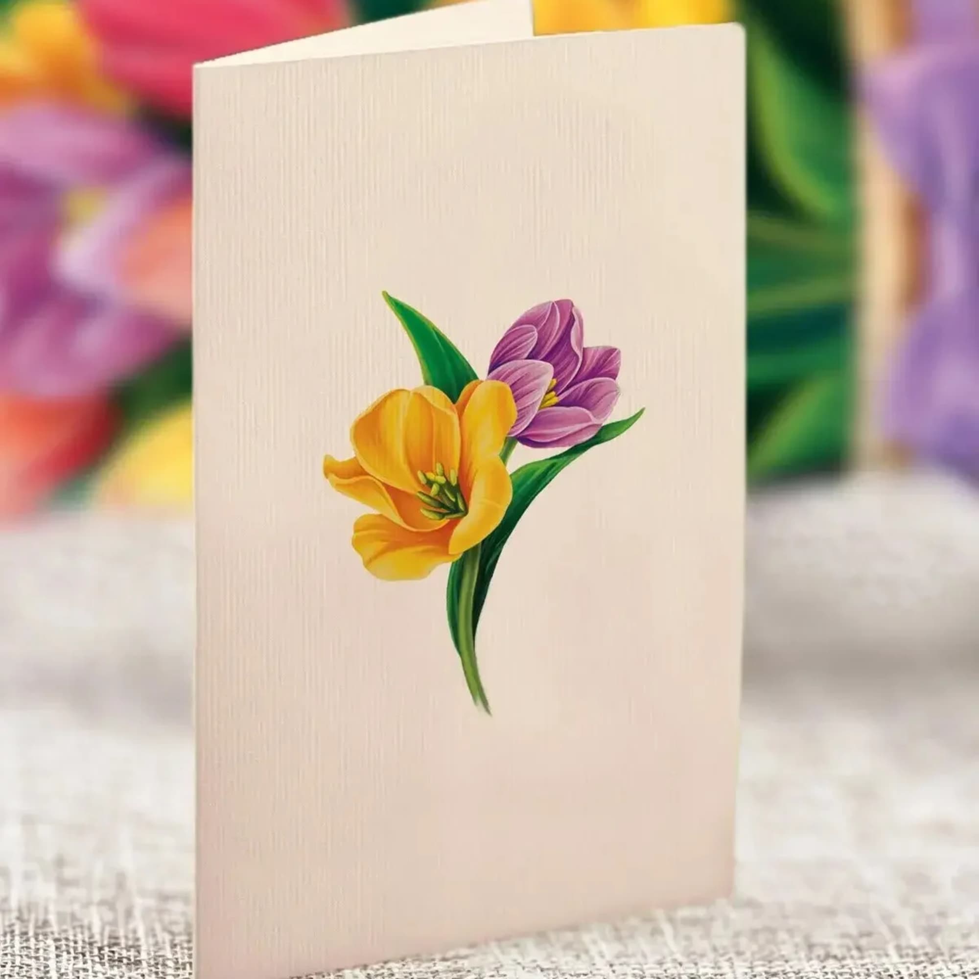 Folded card with a yellow and purple flower illustration