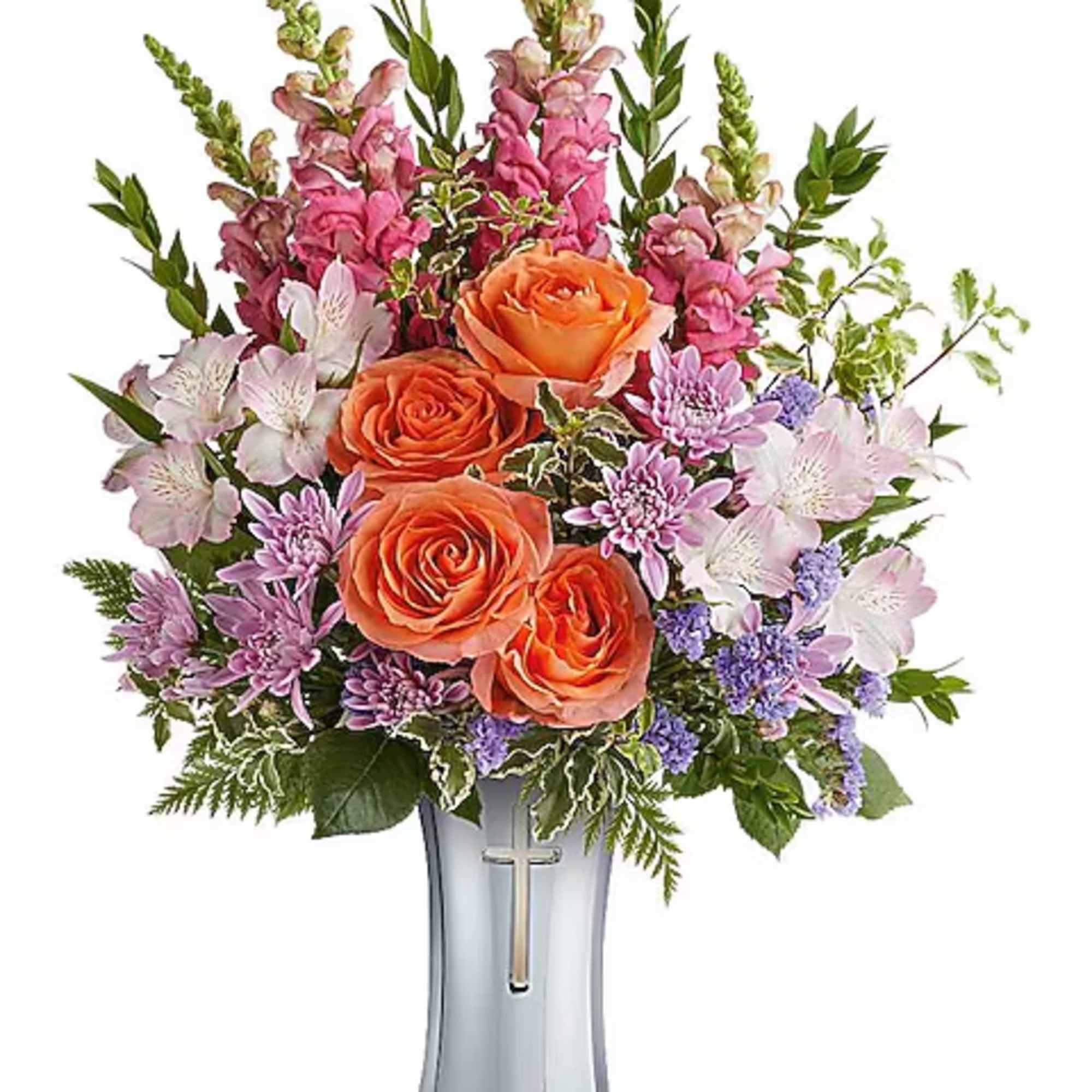 Orange roses and pink-purple flowers in a silver vase with a cross