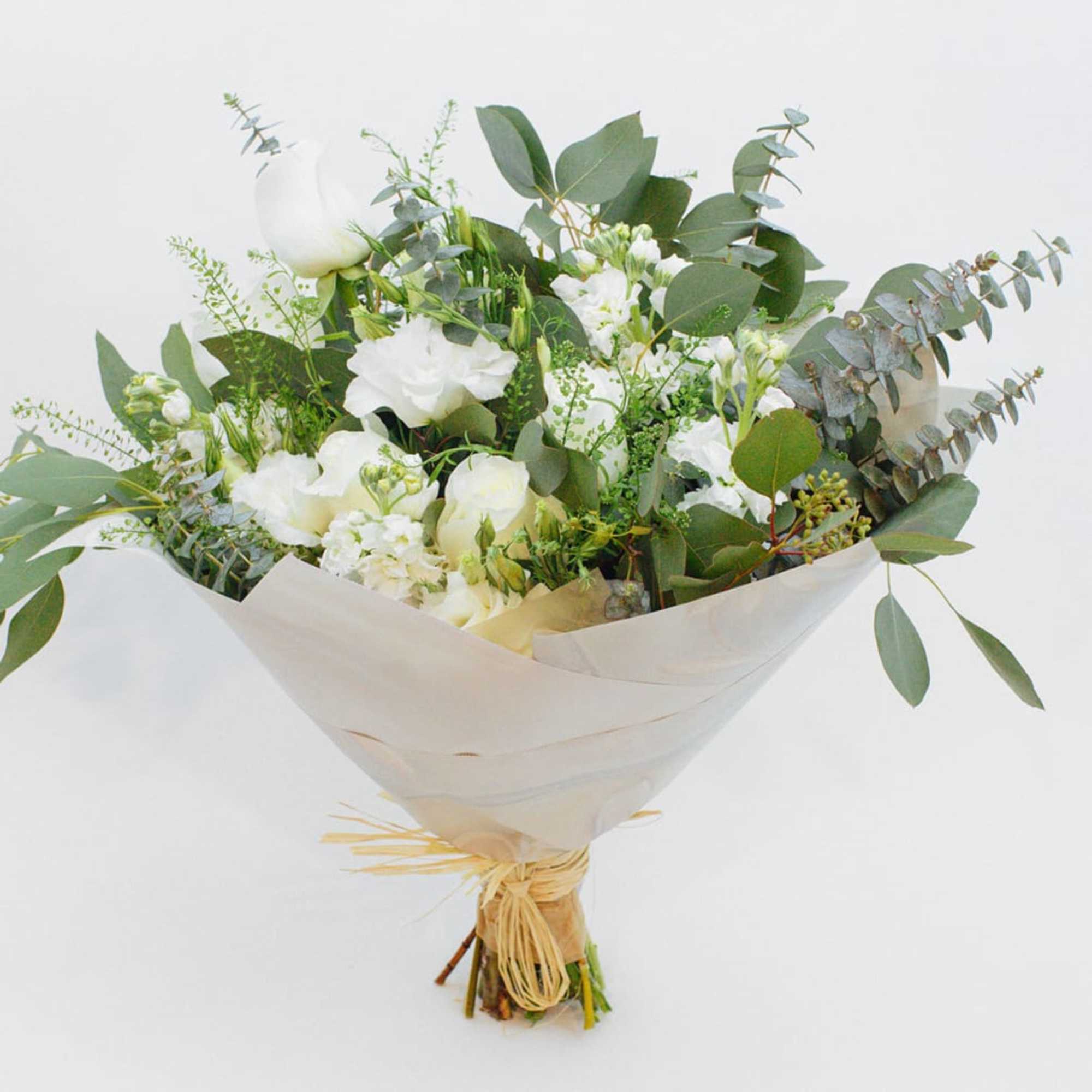 White bouquet with eucalyptus and wrapped stems