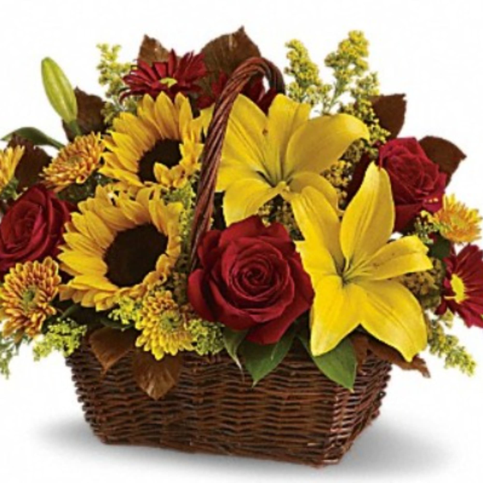 Basket arrangement with red roses, yellow lilies, and sunflowers