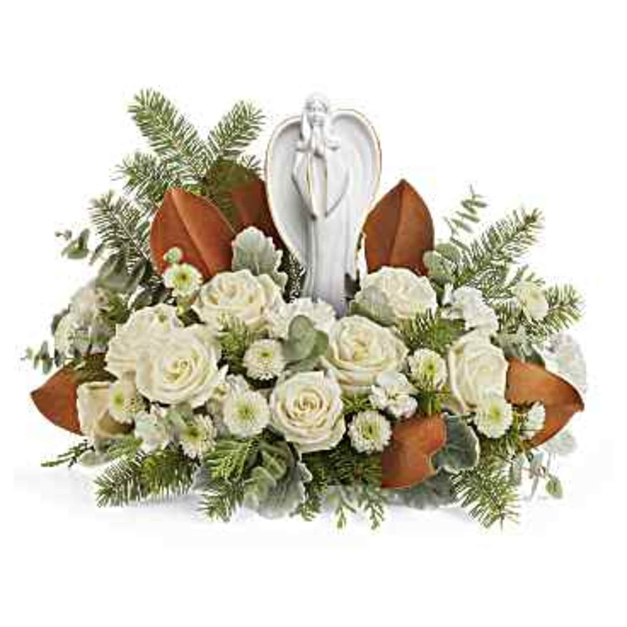 White rose arrangement with an angel figurine