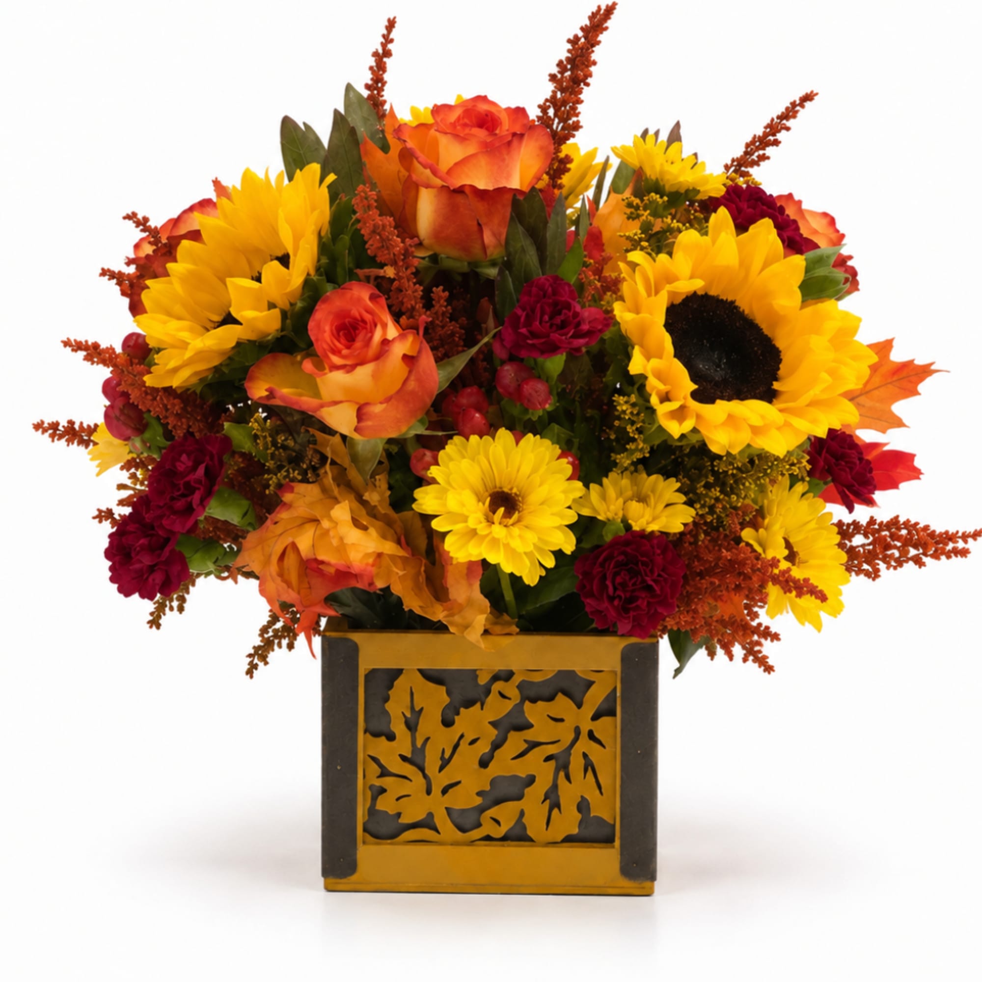 Autumn floral arrangement with sunflowers, roses, and mums in a decorative square container