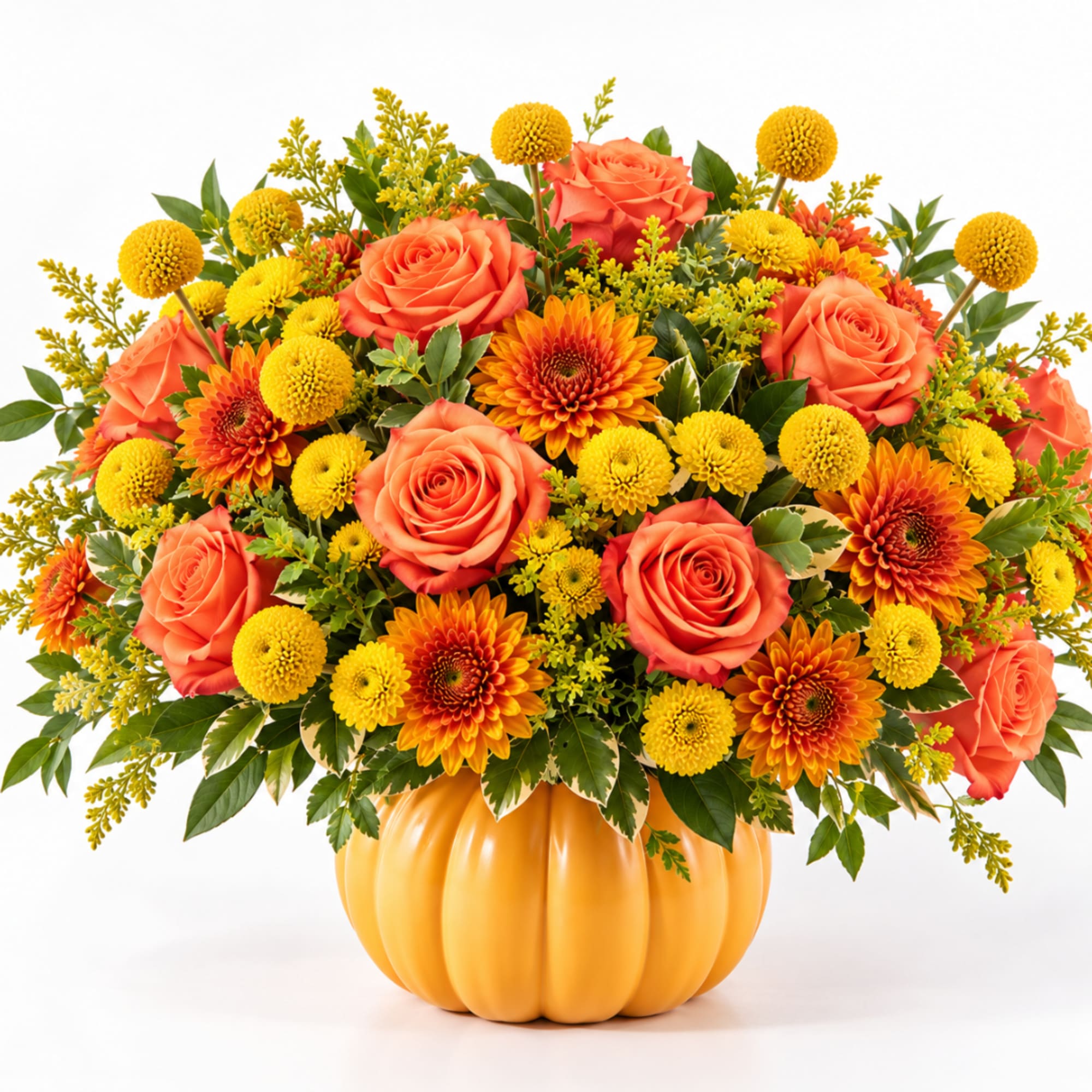 Orange roses and yellow mums in a pumpkin-shaped vase