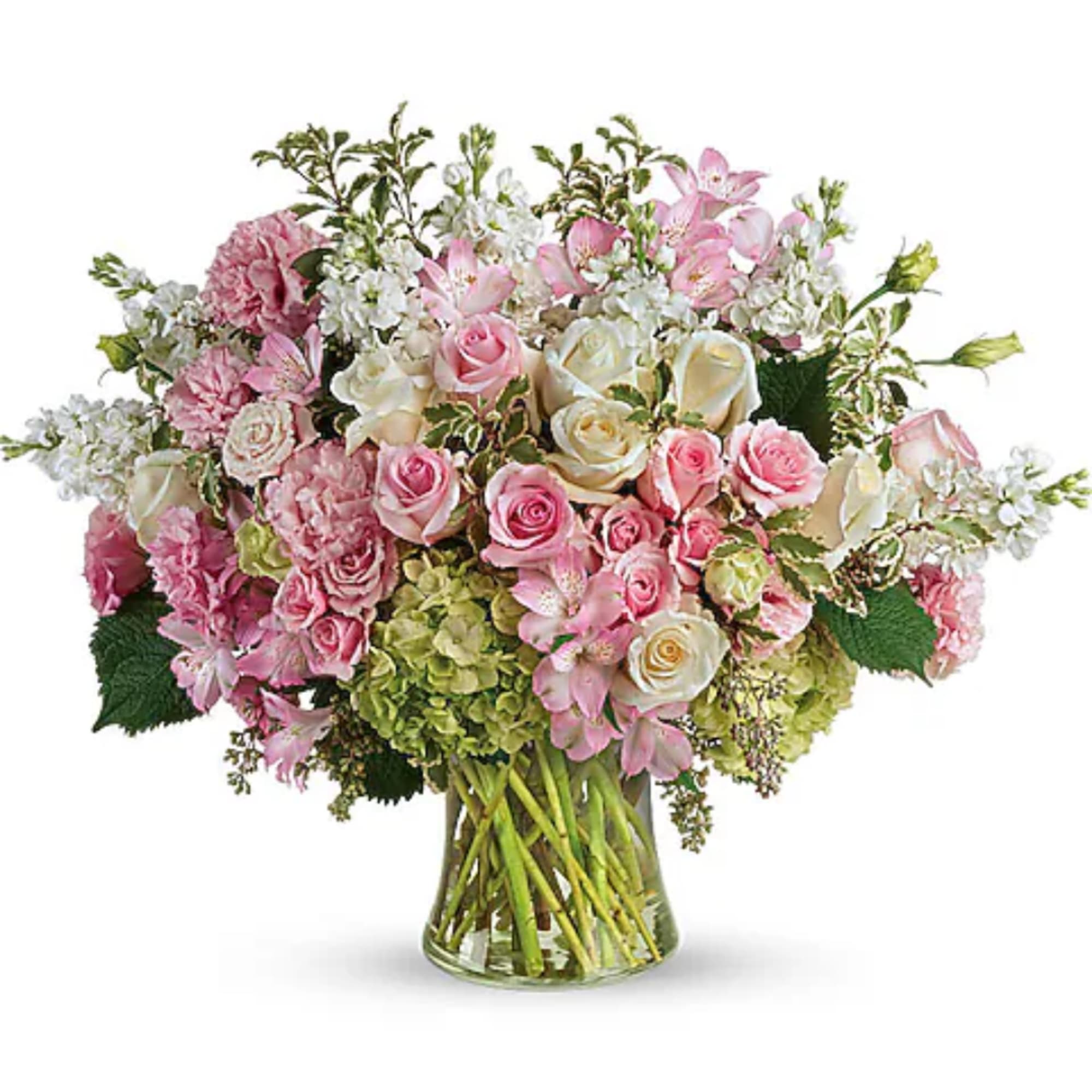 Pink and white mixed bouquet in a clear glass vase