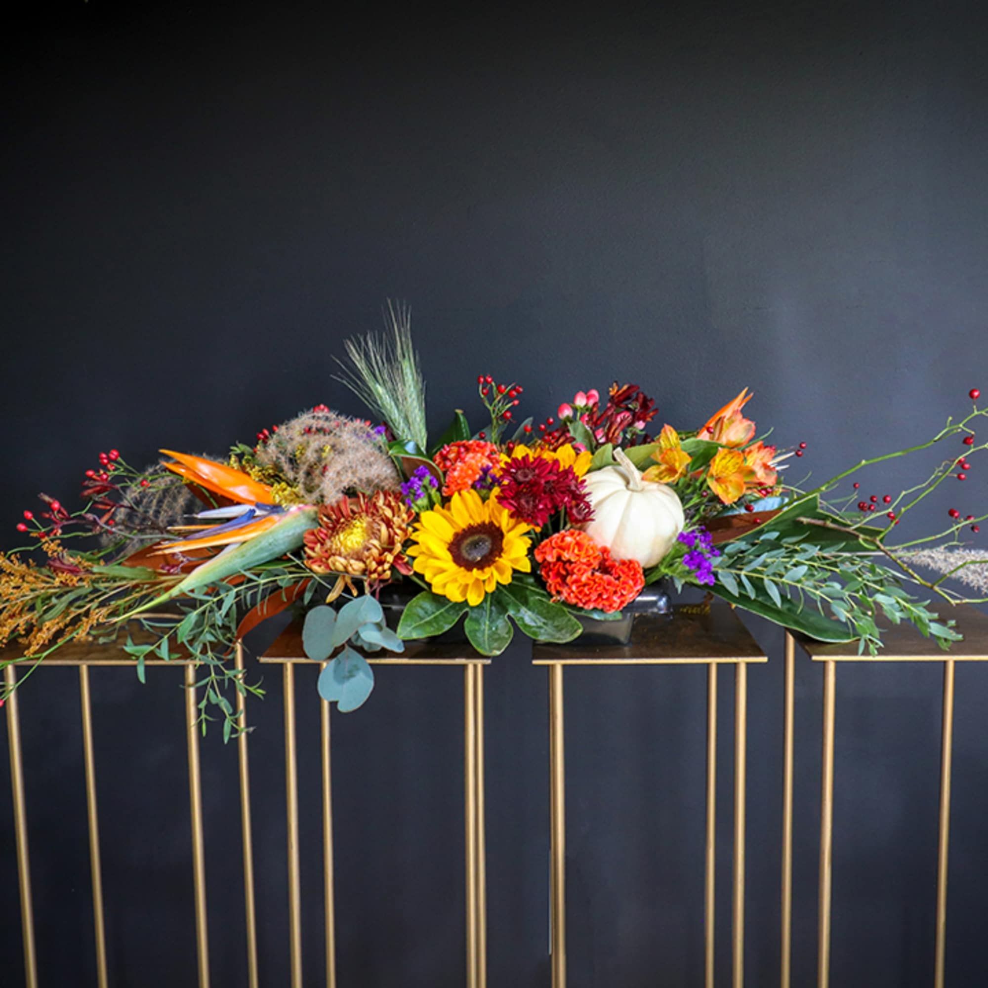 Bountiful lush beautiful collection of fall colors in this table centerpiece for, photo 2 of 3