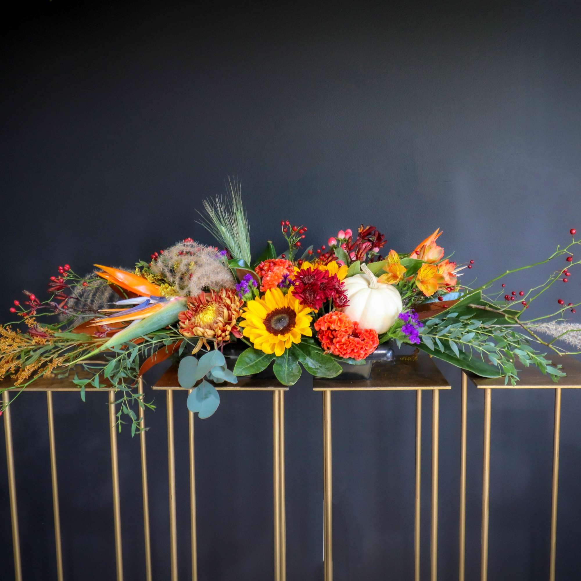 Bountiful lush beautiful collection of fall colors in this table centerpiece for