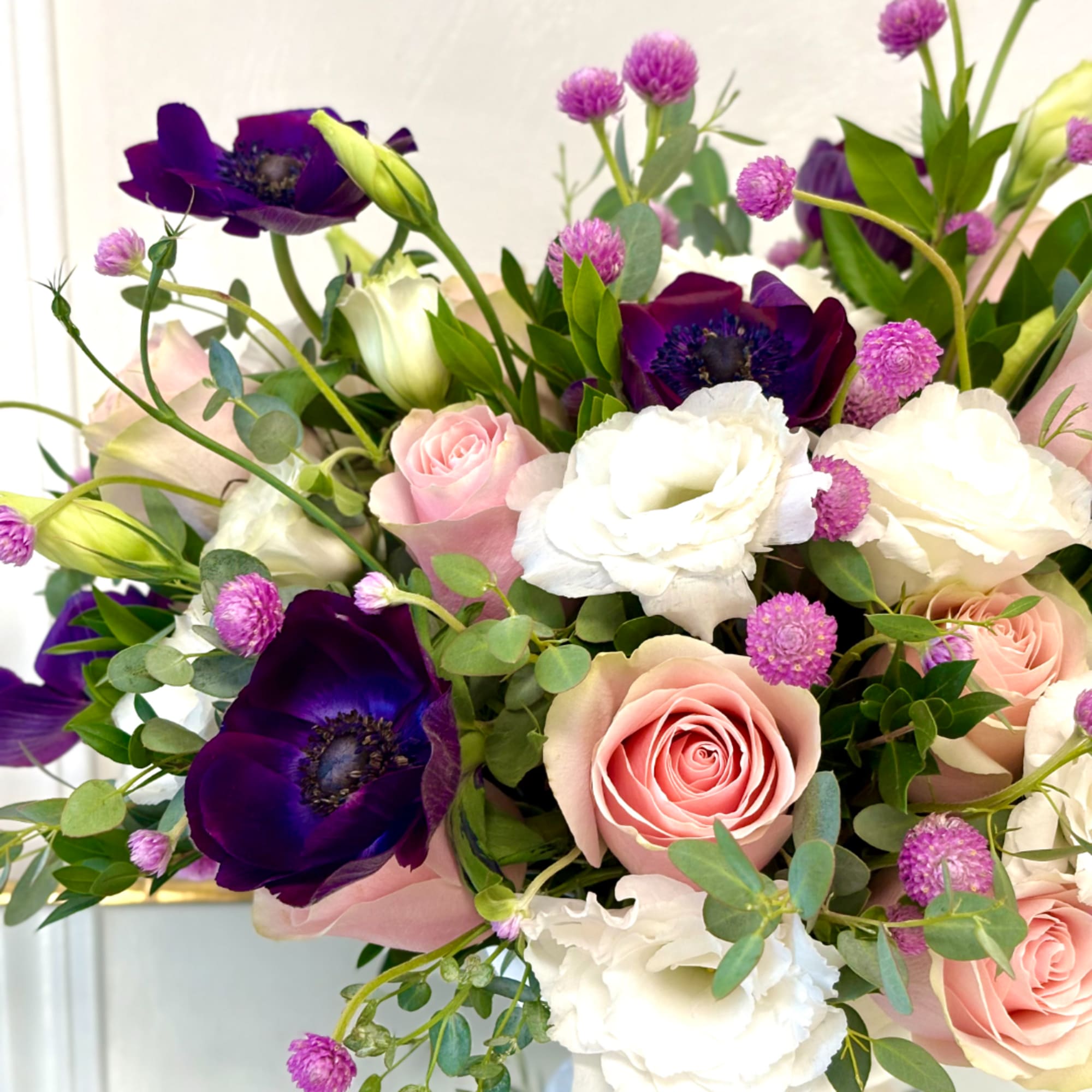 Bouquet of pink roses, white blooms, and deep purple flowers, photo 4 of 4
