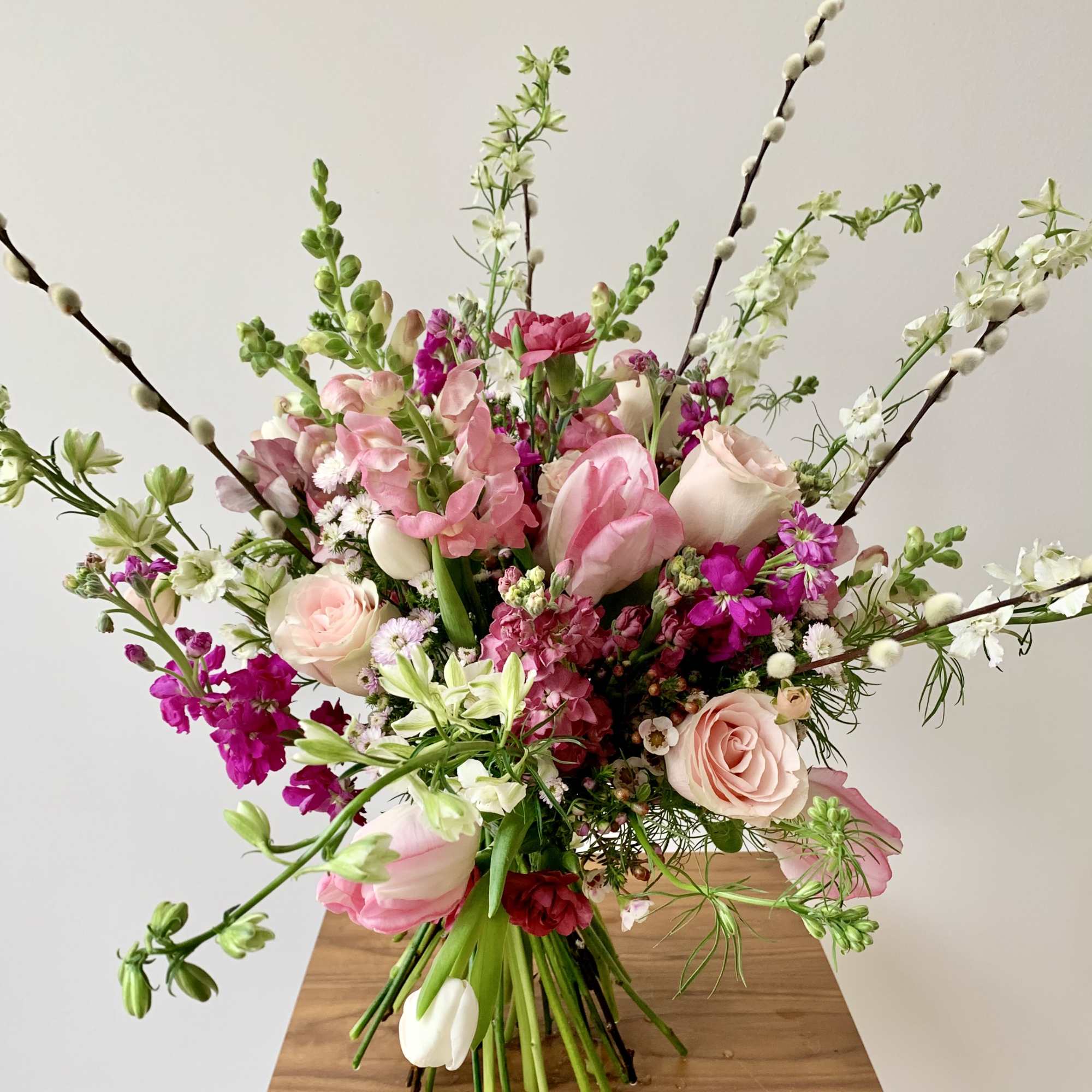 Large pink and white mixed bouquet with tall branching stems