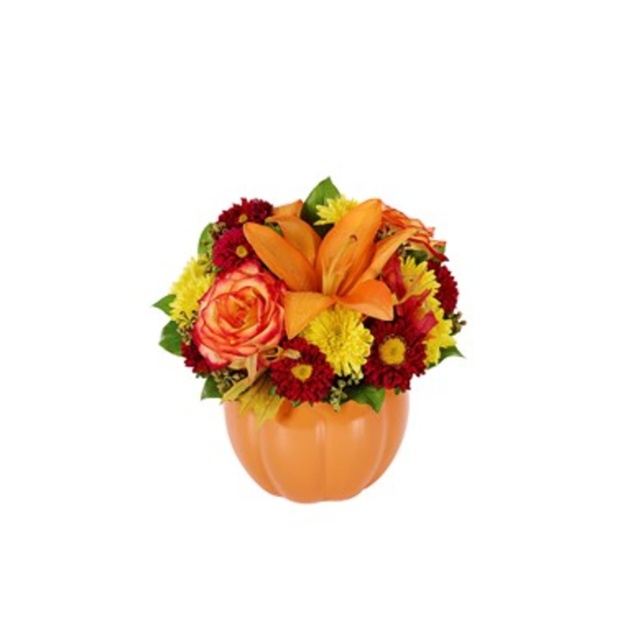 Orange lilies and mixed mums in a pumpkin-shaped vase