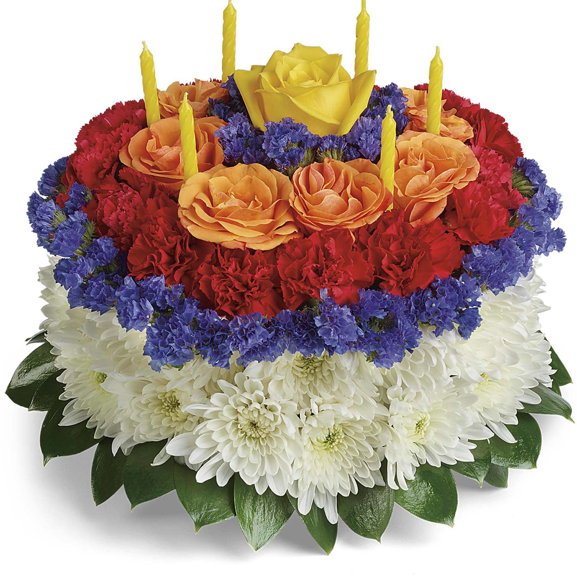 Round floral arrangement with candles and multicolored blooms