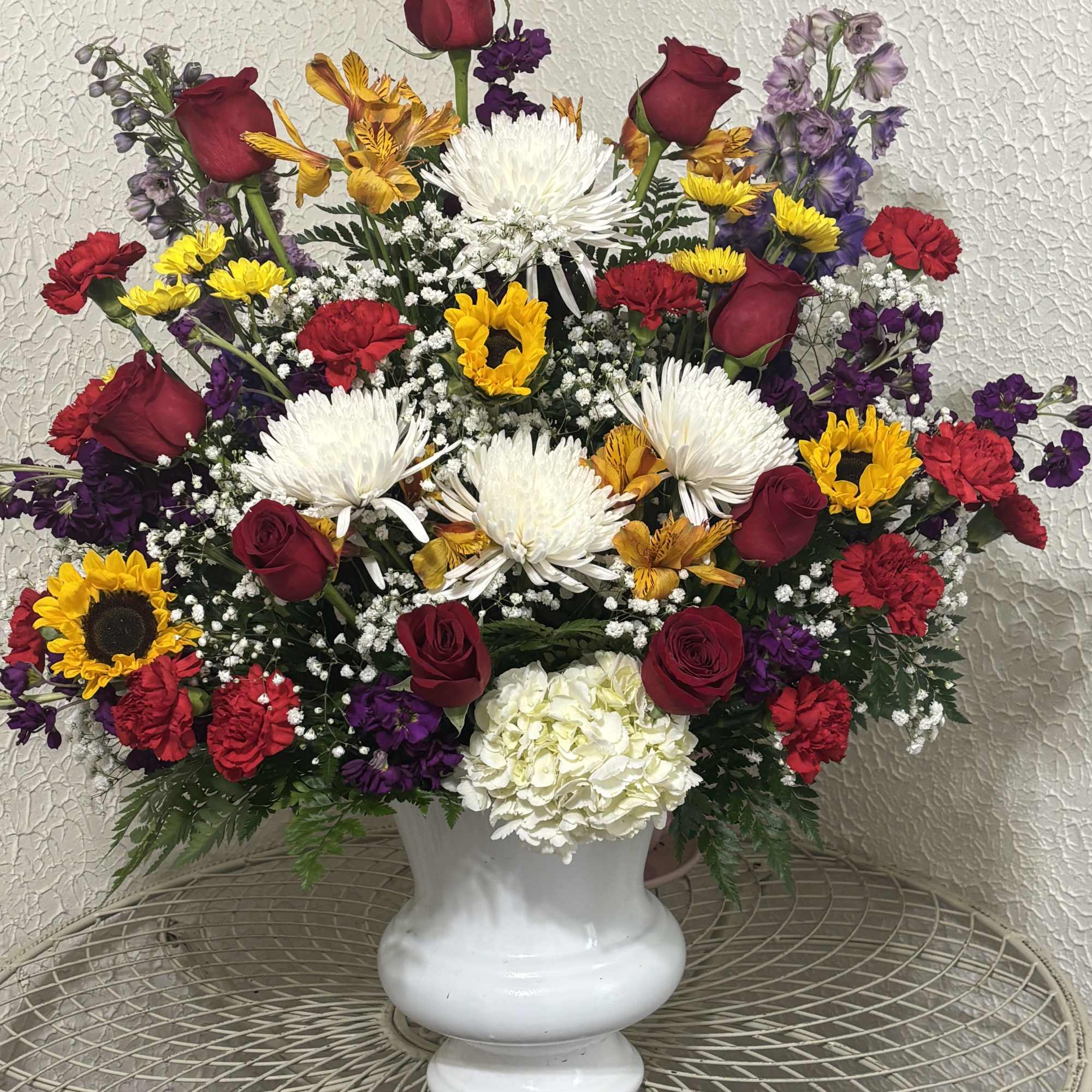 Magnificent sympathy floral arrangement that stuns and is perfect when a smaller