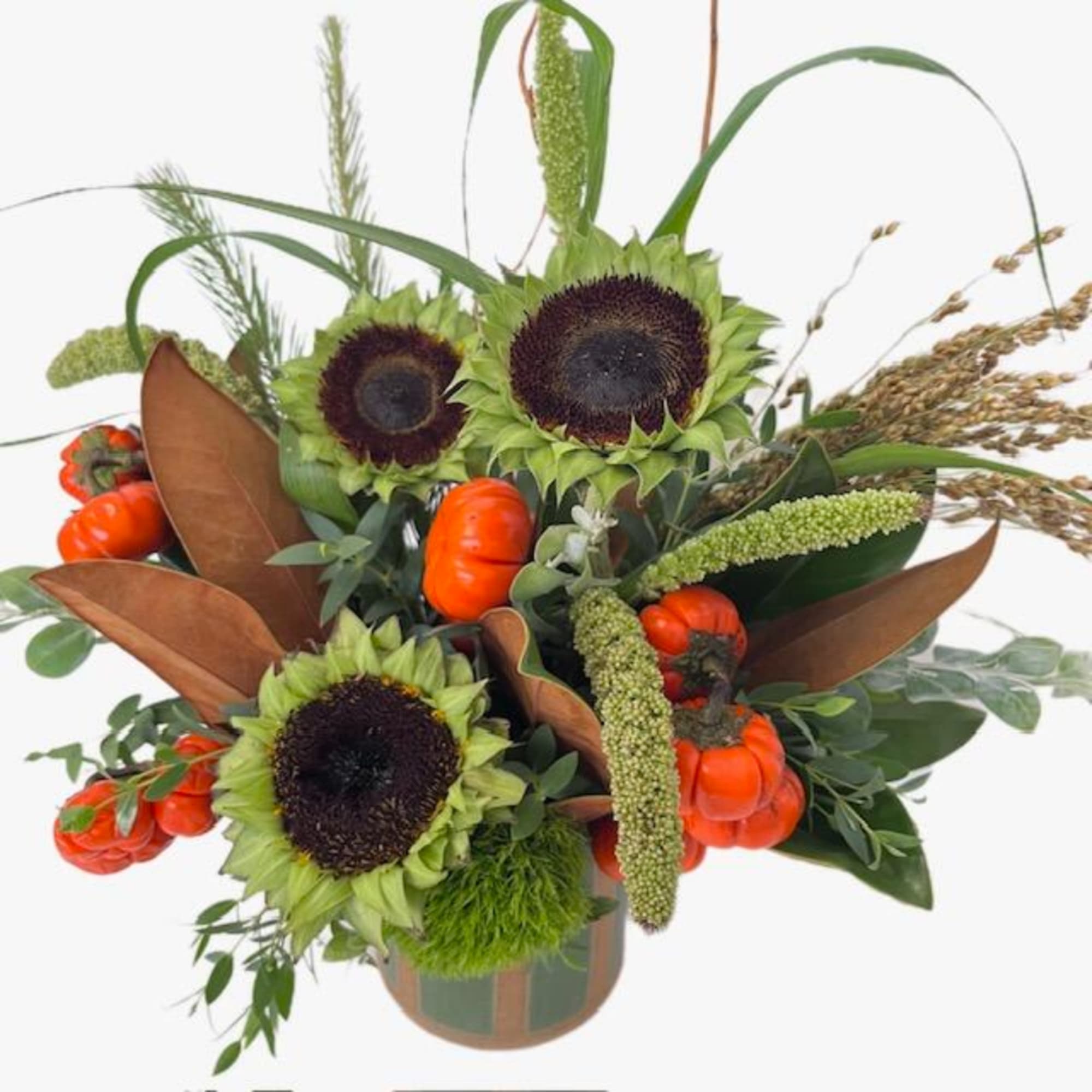 Sunflower arrangement with orange pumpkins in a vase