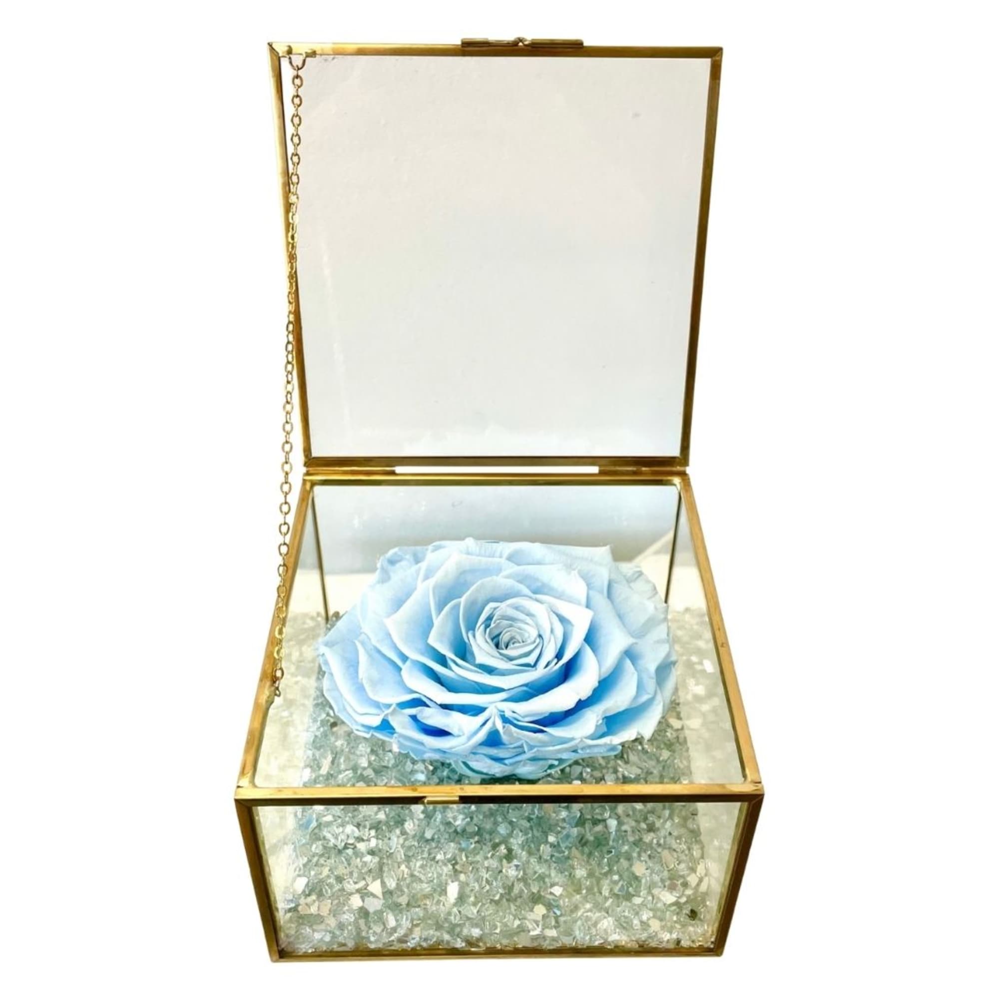 Blue rose in a glass keepsake box with a gold frame