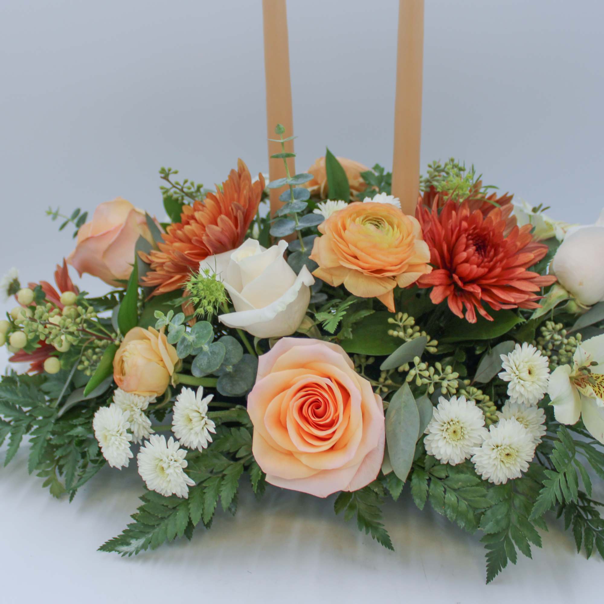Ginger Spice is a traditional long and low centerpiece with beautiful Peach, photo 2 of 2