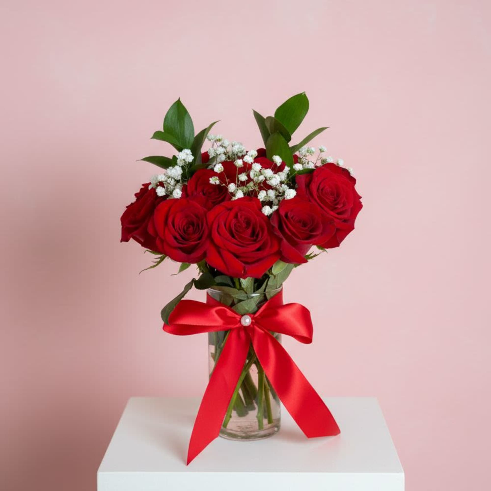 Red roses in a glass vase with a red ribbon, photo 2 of 4