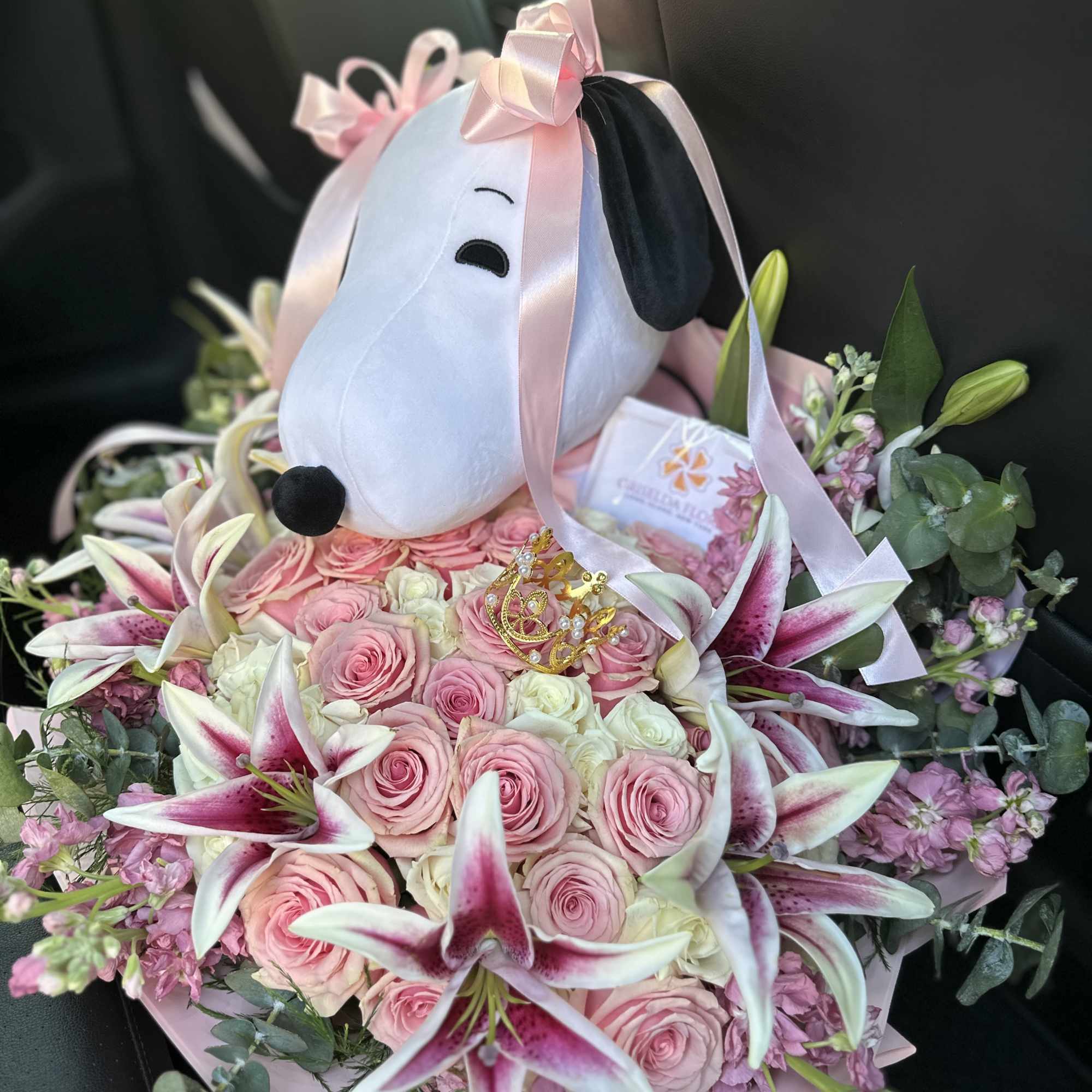 Pink rose bouquet with lilies and a Snoopy plush topper, photo 5 of 5