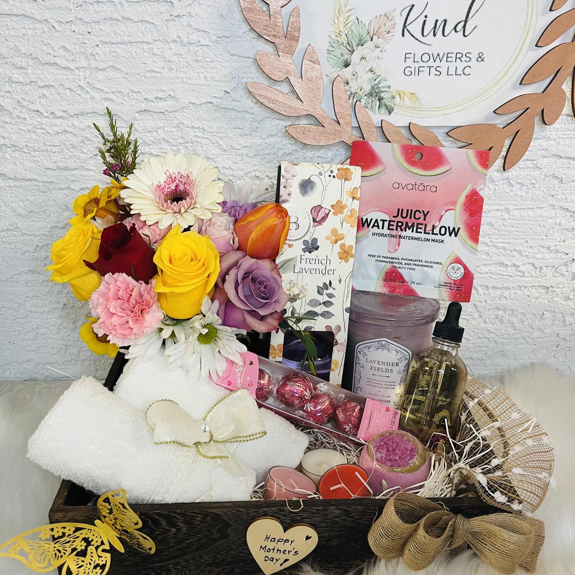 Gift basket with mixed flowers, candles, chocolates, and bath items, photo 2 of 4