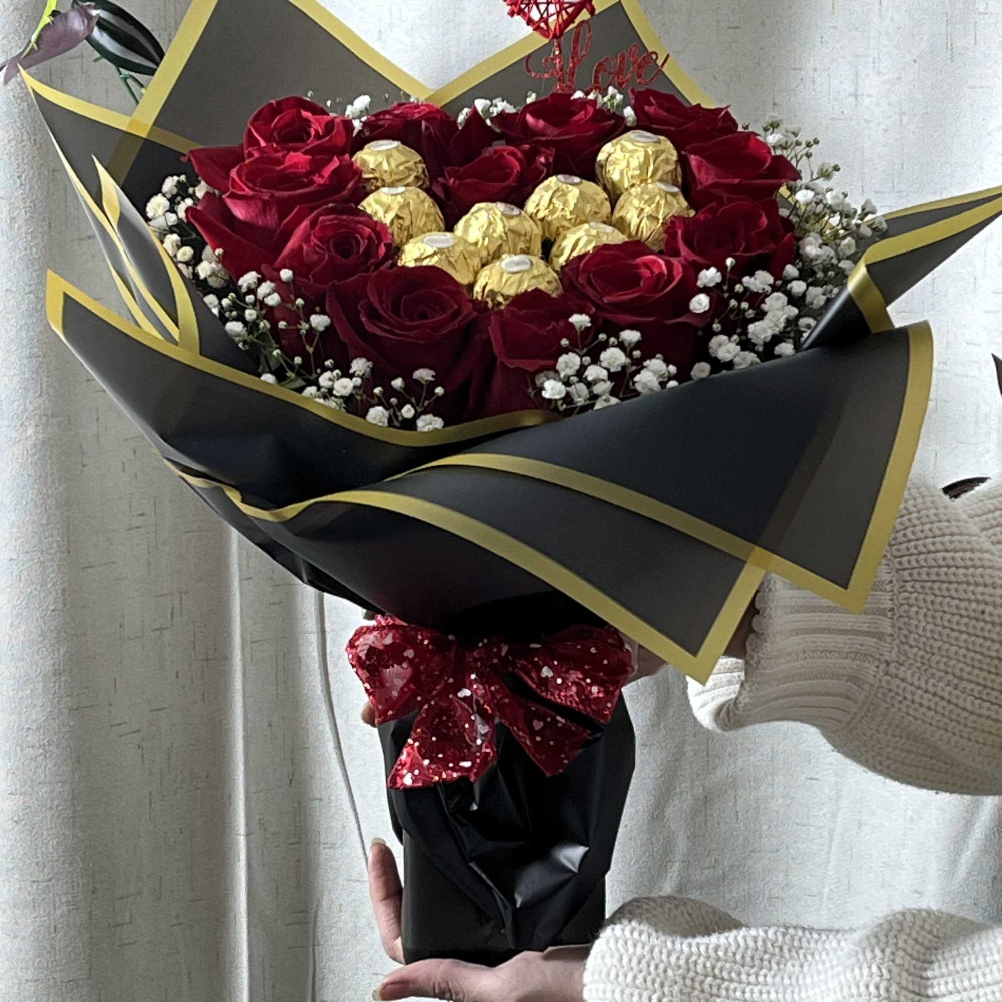 Bouquet of red roses with gold-wrapped chocolates and a heart topper, photo 5 of 5