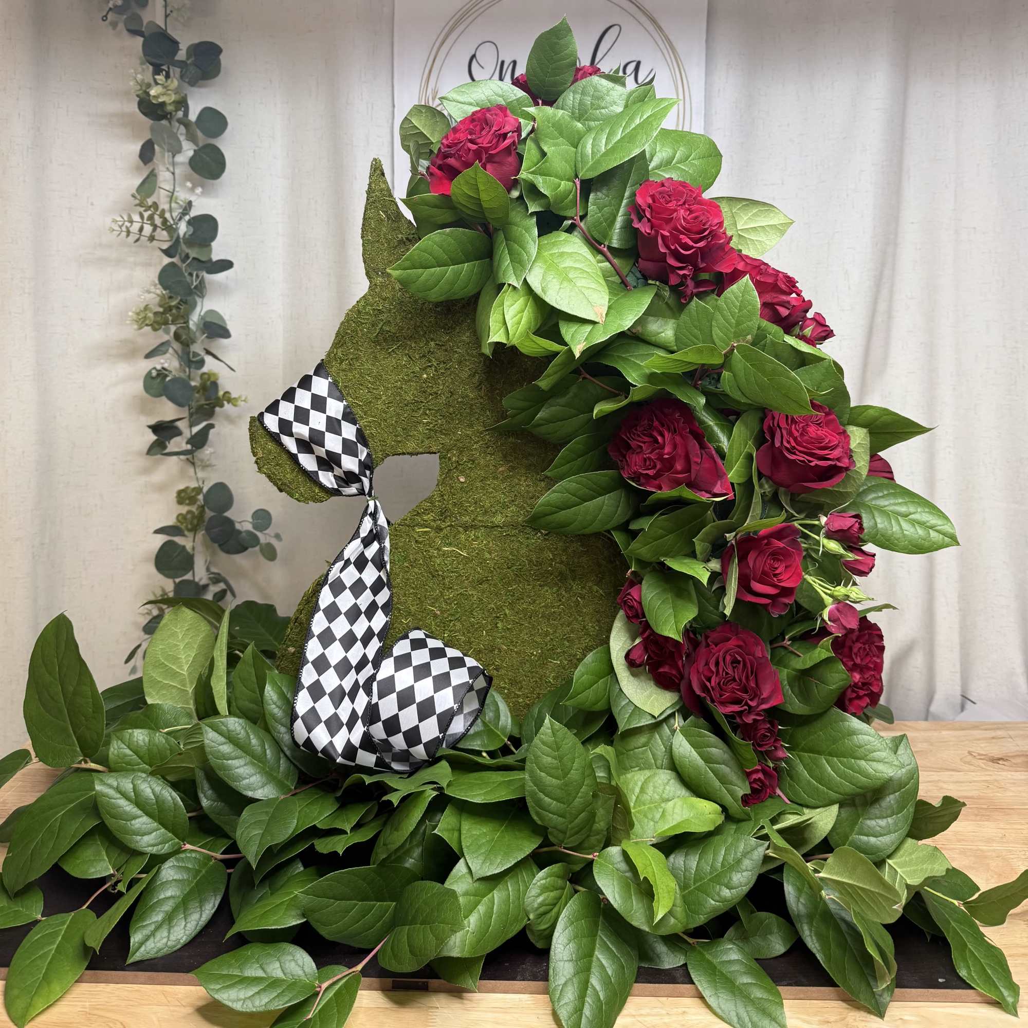 A unique and elegant horse-shaped floral design, created to honor a loved, photo 2 of 2