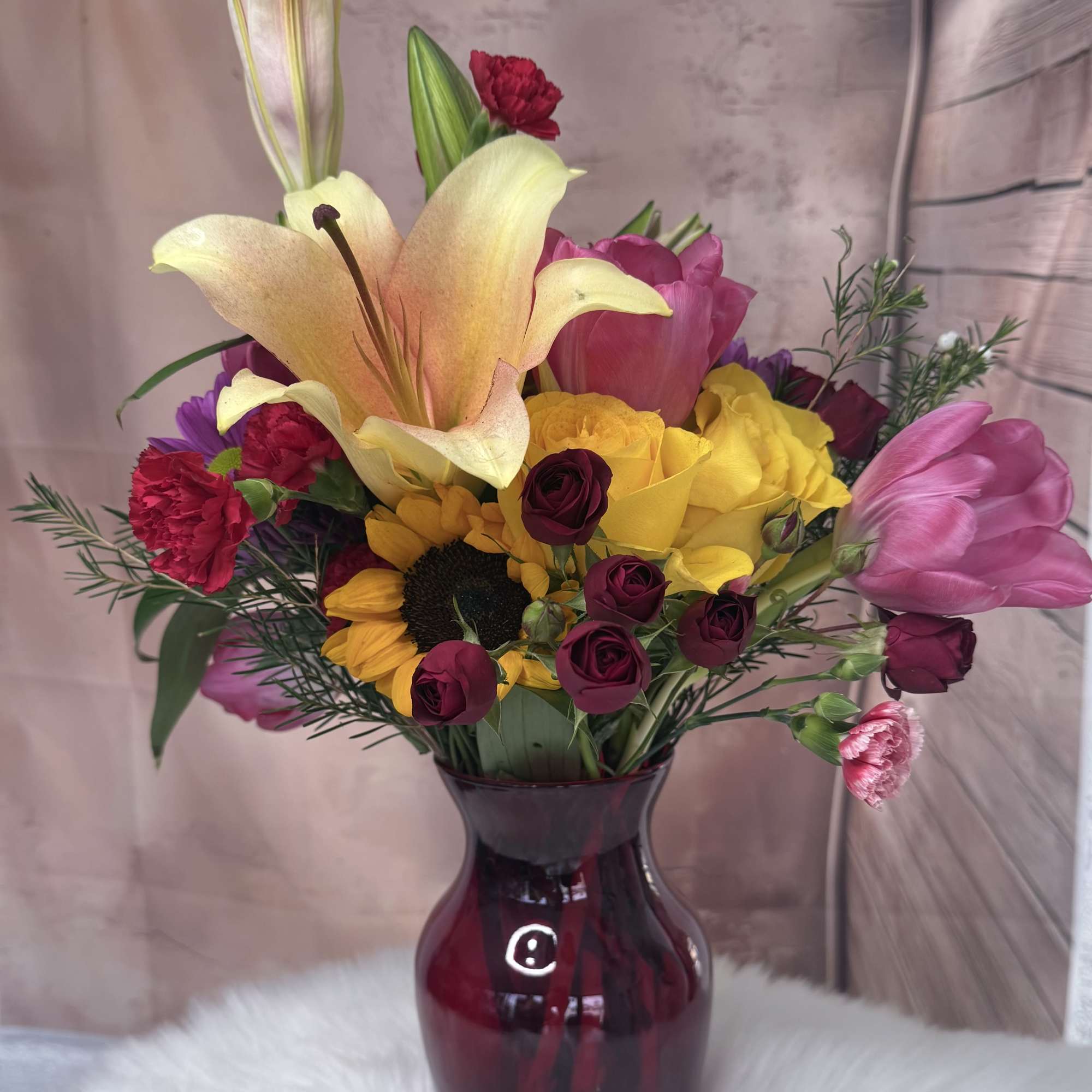 A  vibrant arrangement of assorted fresh flowers, bautifully designed whit a, photo 2 of 2