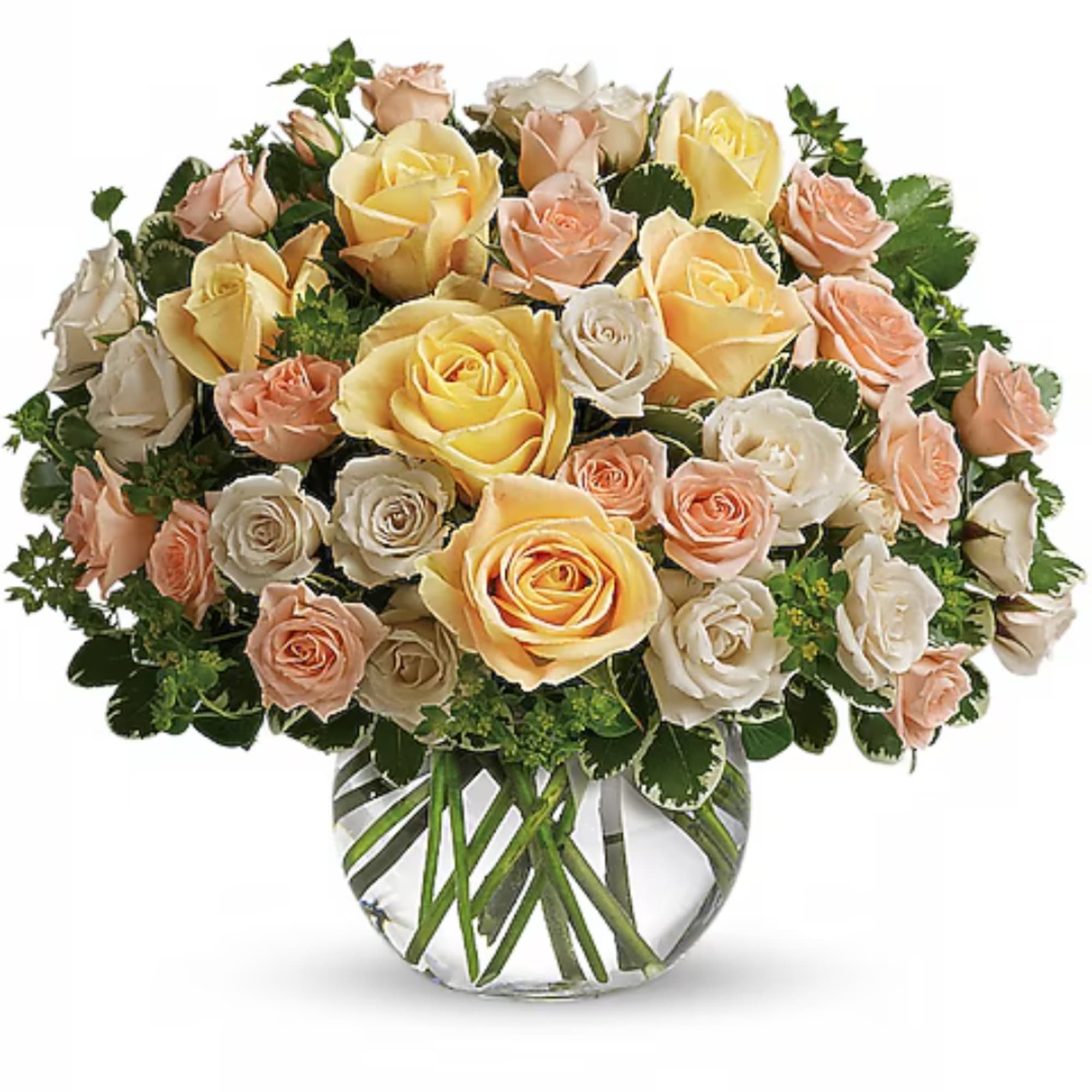 Bouquet of yellow, peach, and white roses in a clear glass vase