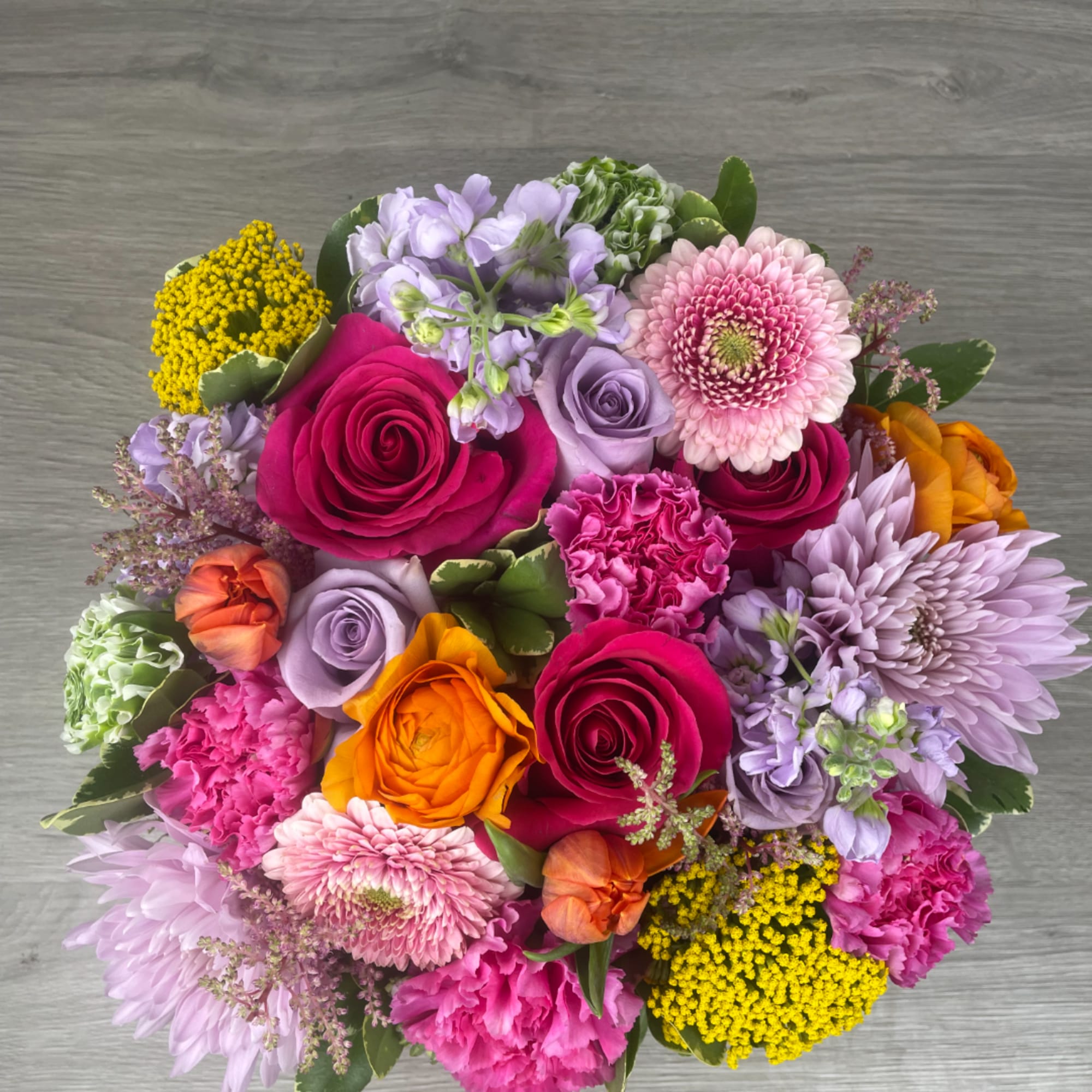 Colorful bouquet of roses, chrysanthemums, and carnations