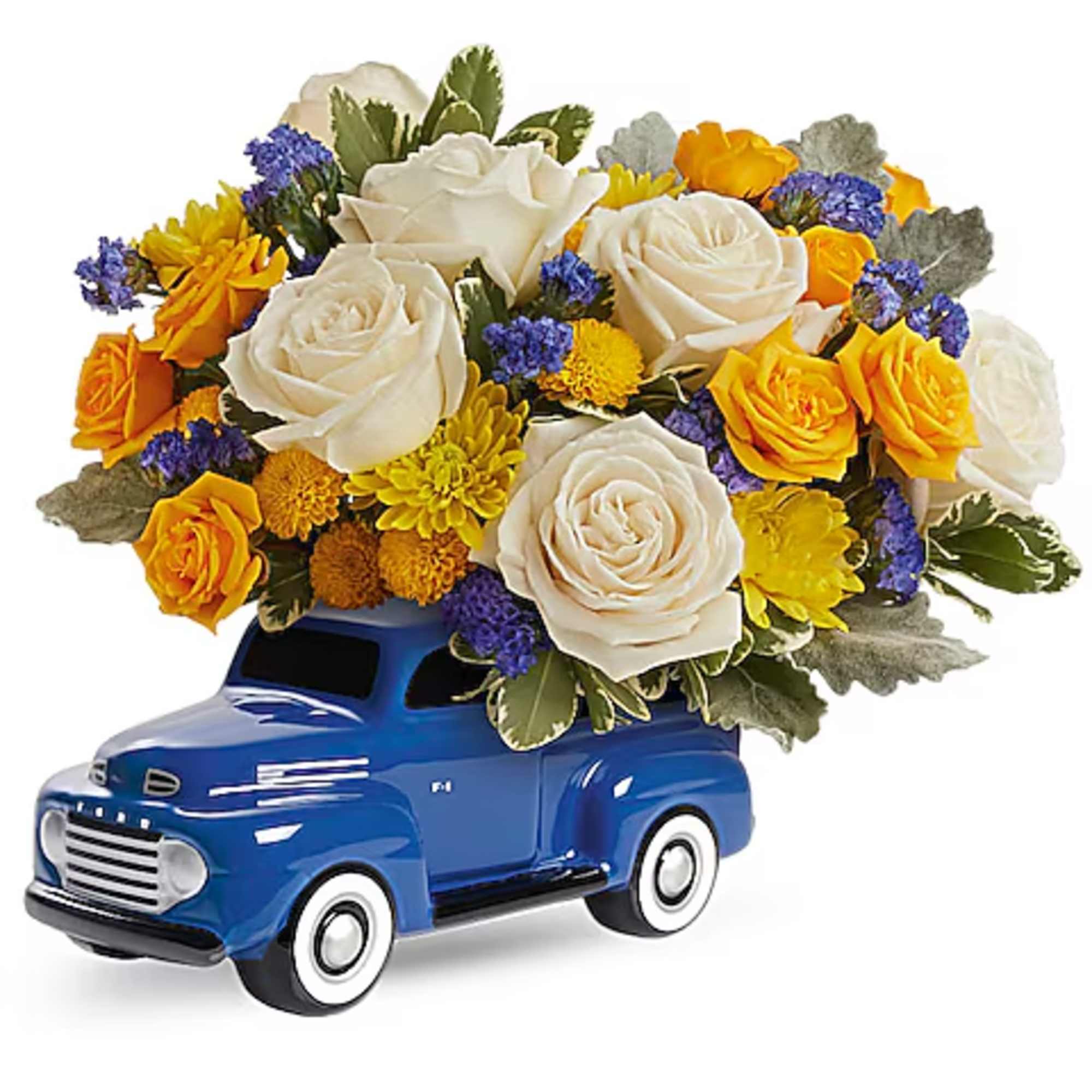 White and yellow roses arranged in a blue toy truck container