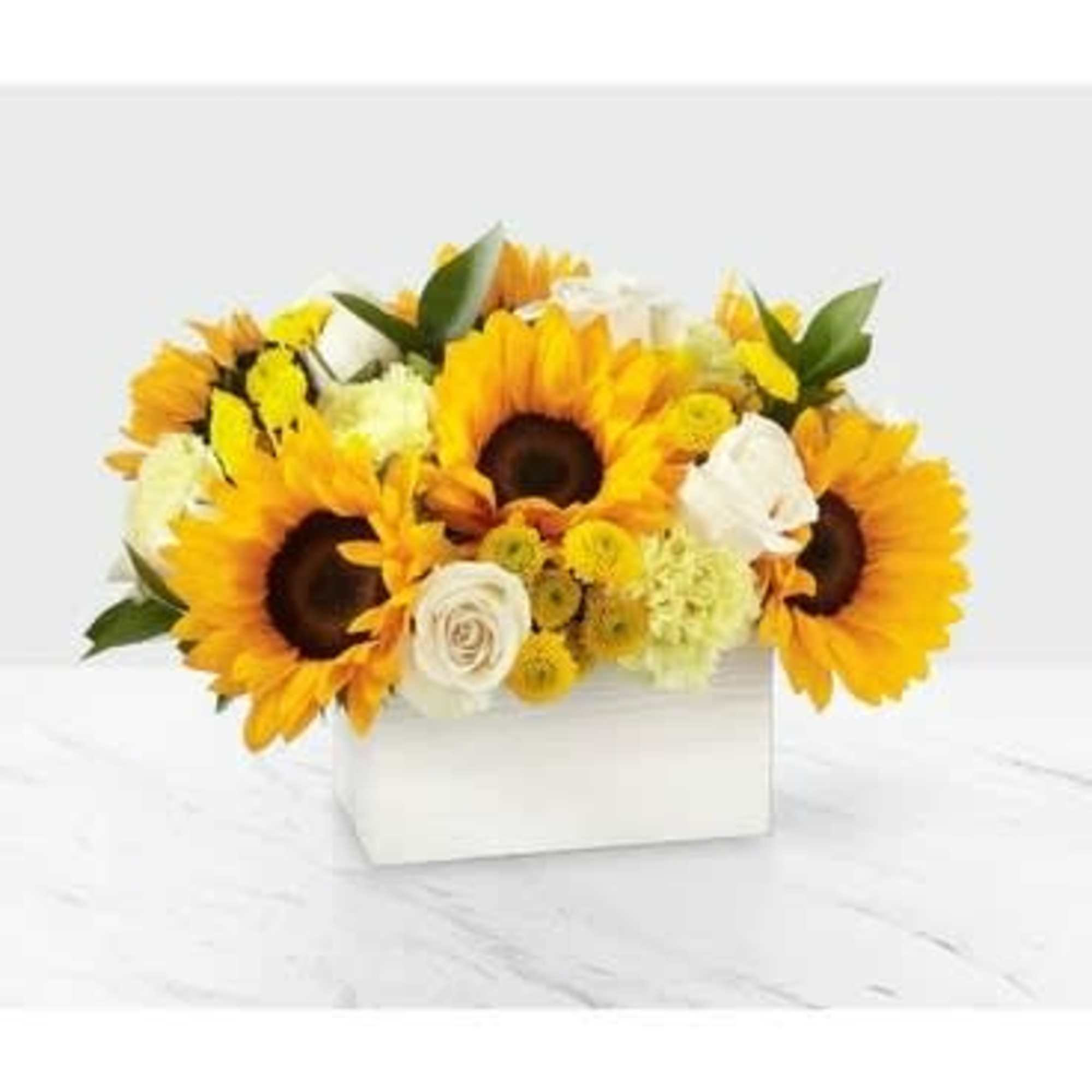 Sunflower arrangement in a white box with white and yellow flowers