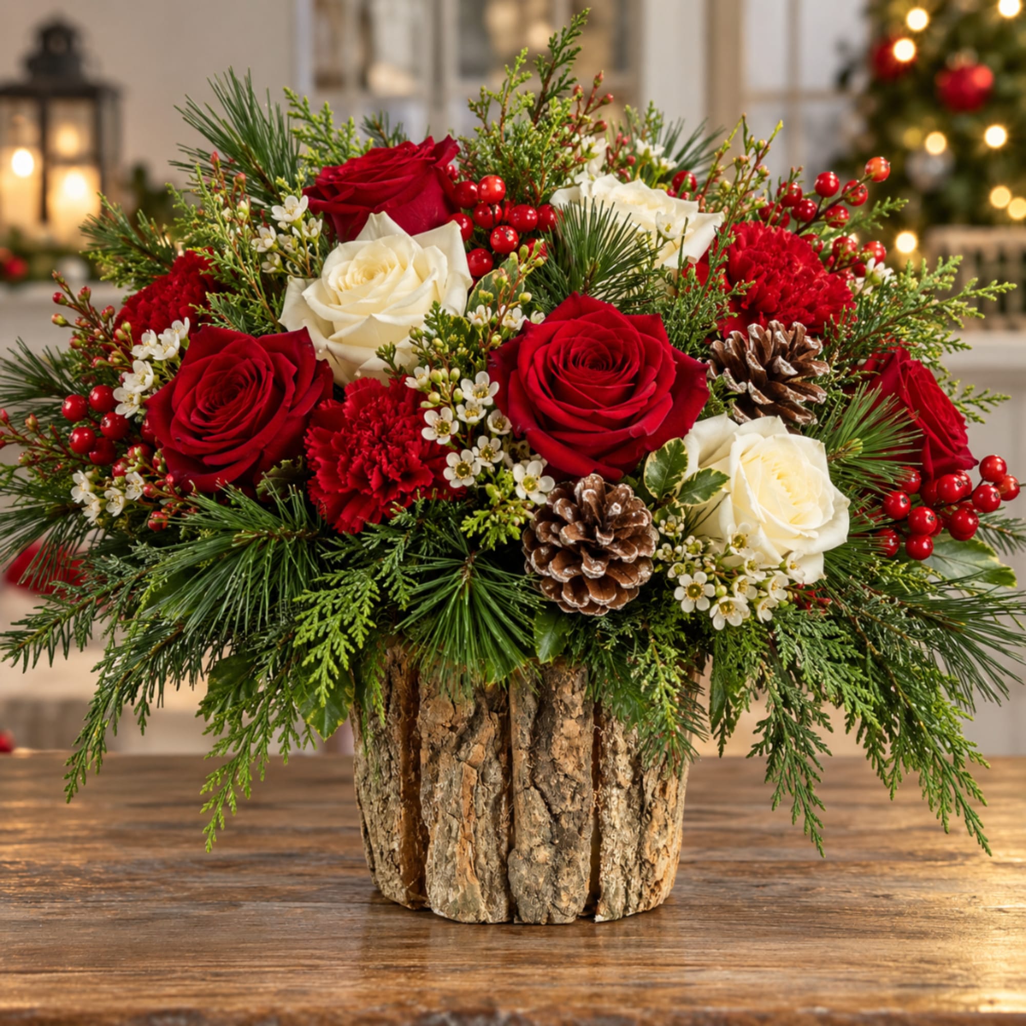 Red and white roses in a rustic bark container with pinecones and evergreens