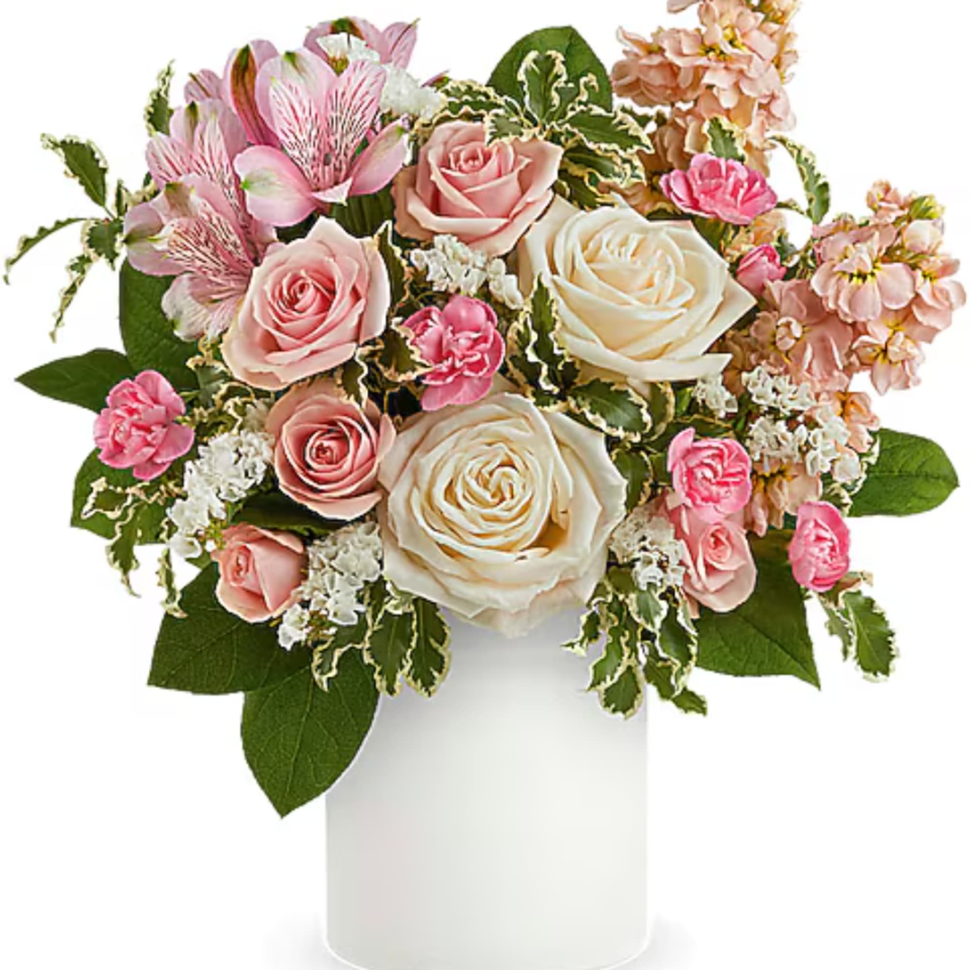 Pink and white rose bouquet in a white vase