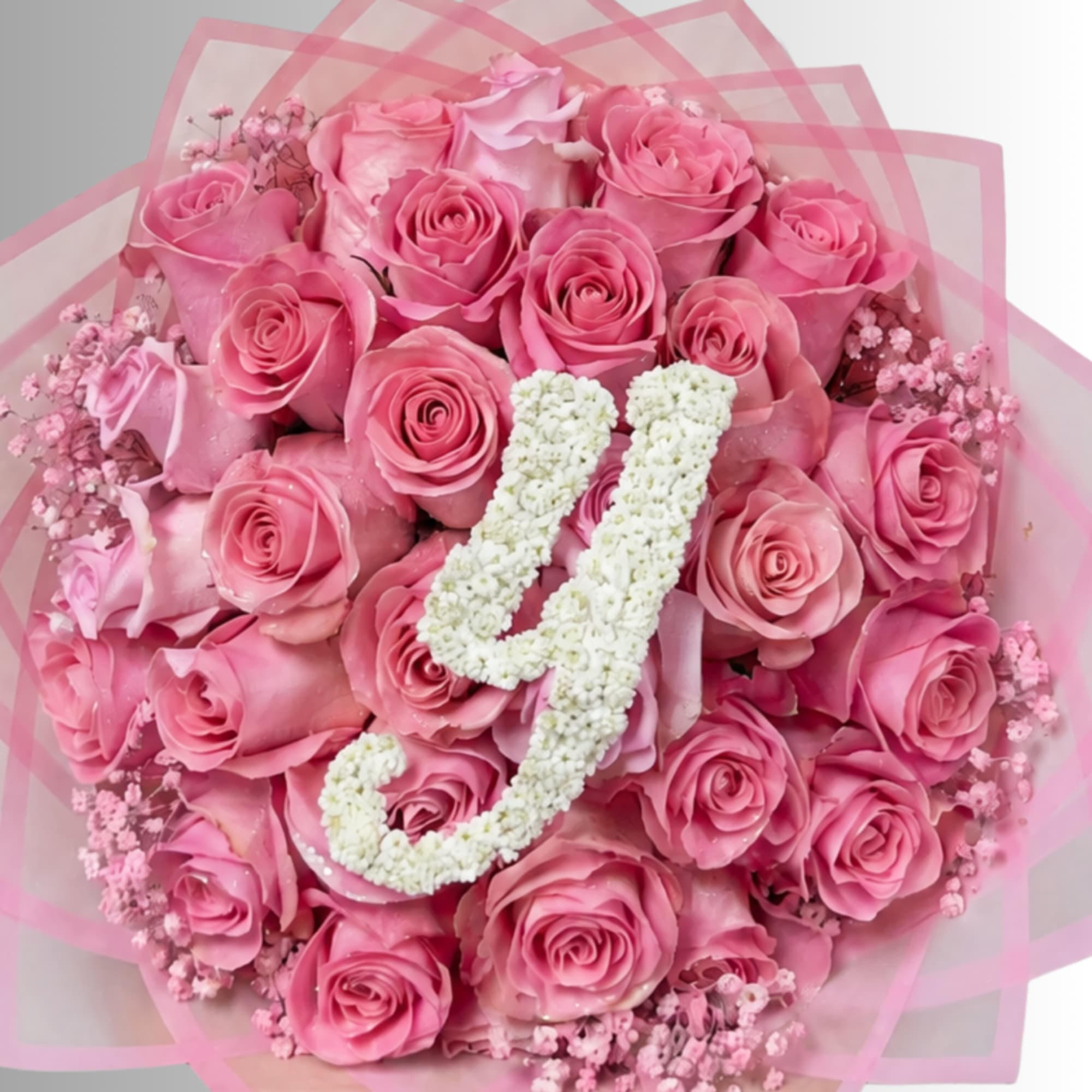 Pink rose bouquet with a white floral number 21 topper