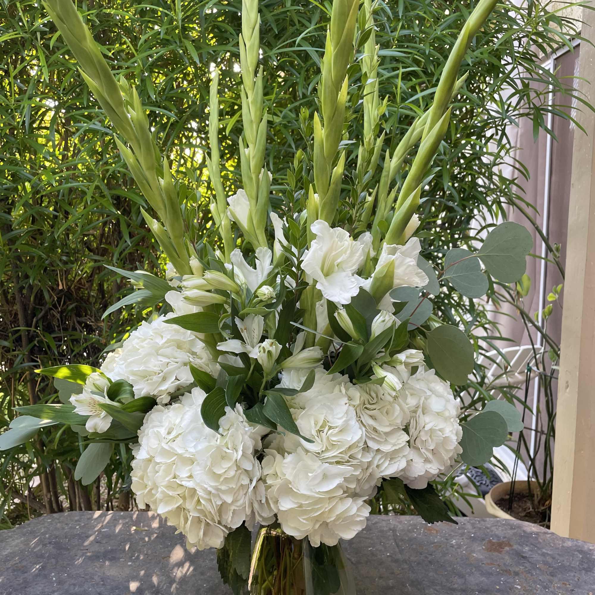 All white arrangement containing gladiolus, alstromeria and hydrangea, photo 2 of 2