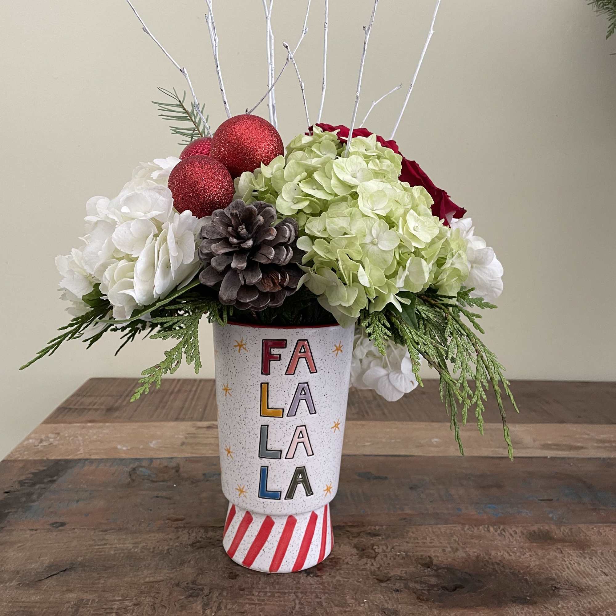 White and green hydrangea, berries and cones